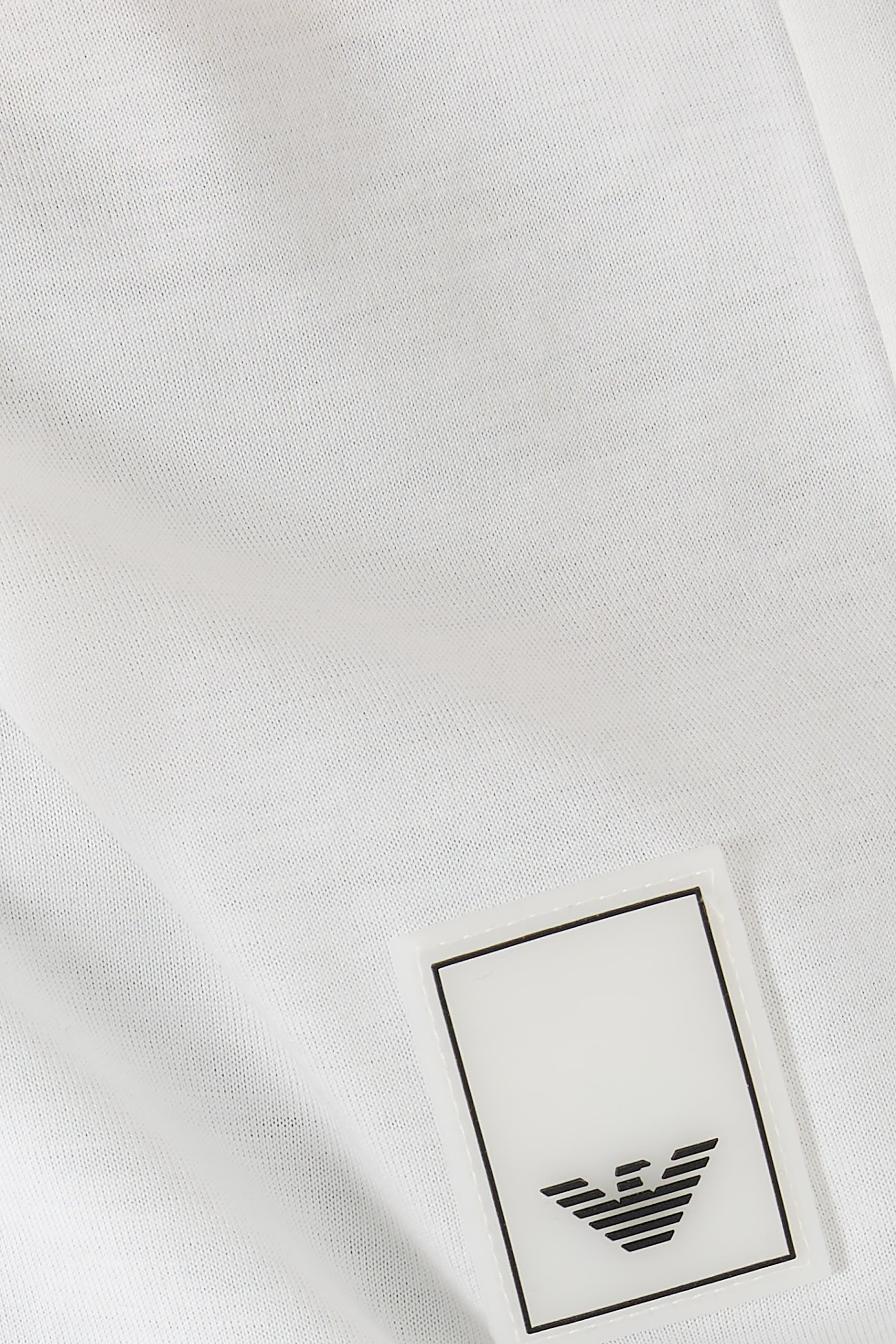 قميص بولو برقعة شعار رأس النسر صغيرة