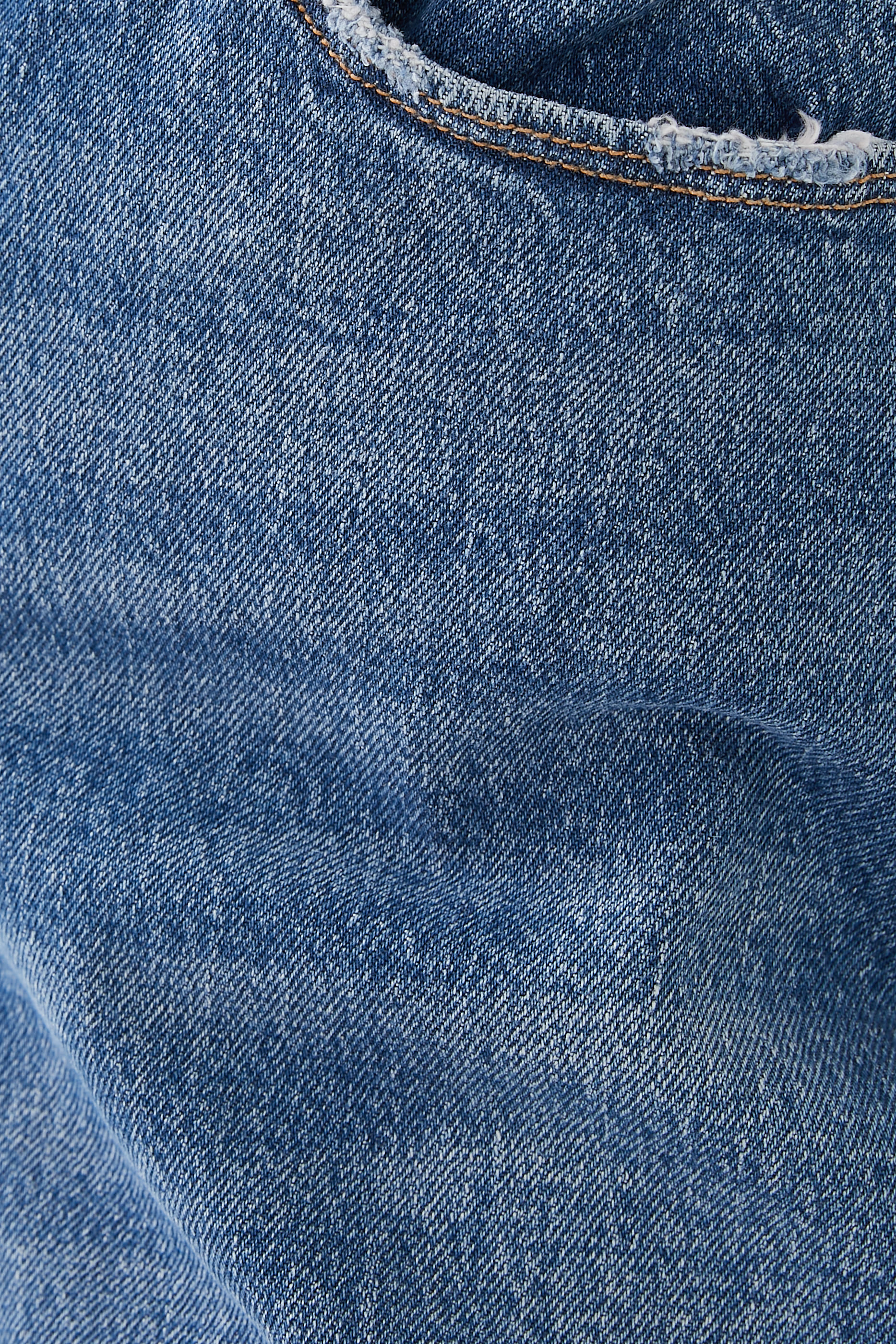 بنطال جينز ويكندر بأساور كاحل