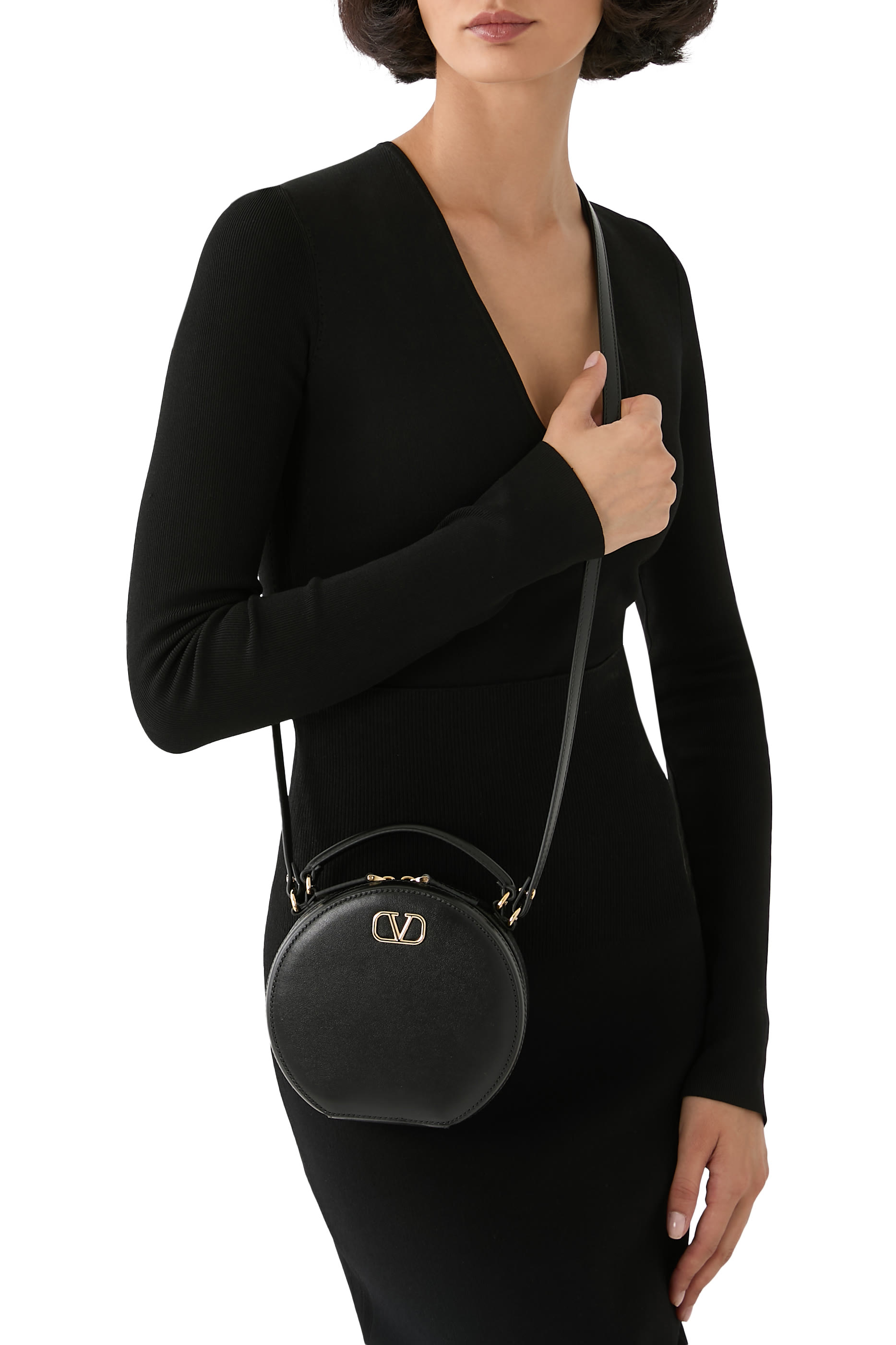 حقيبة صغيرة بشعار الماركة جلد عجل