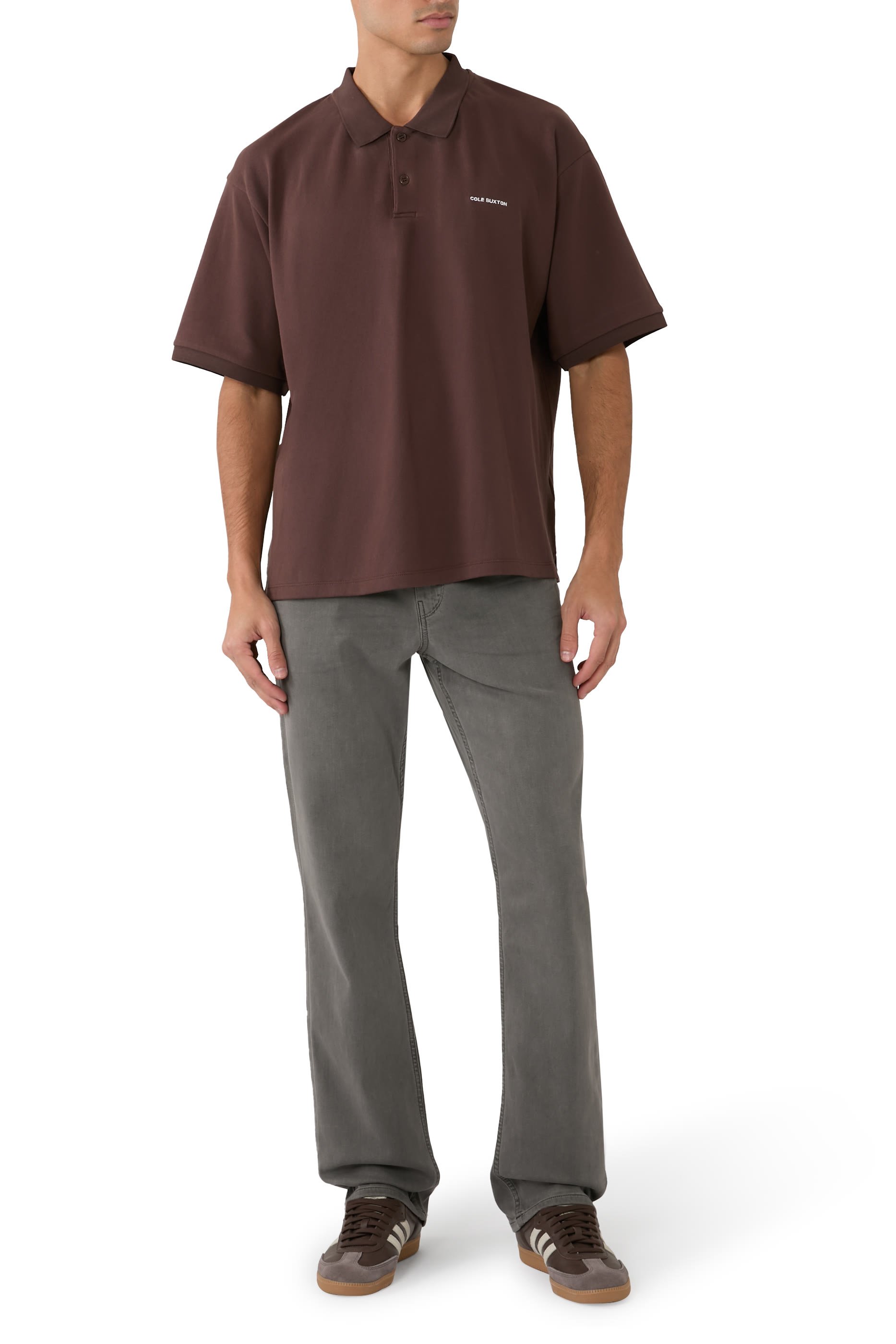 قميص بولو بشعار الماركة بحجم صغير