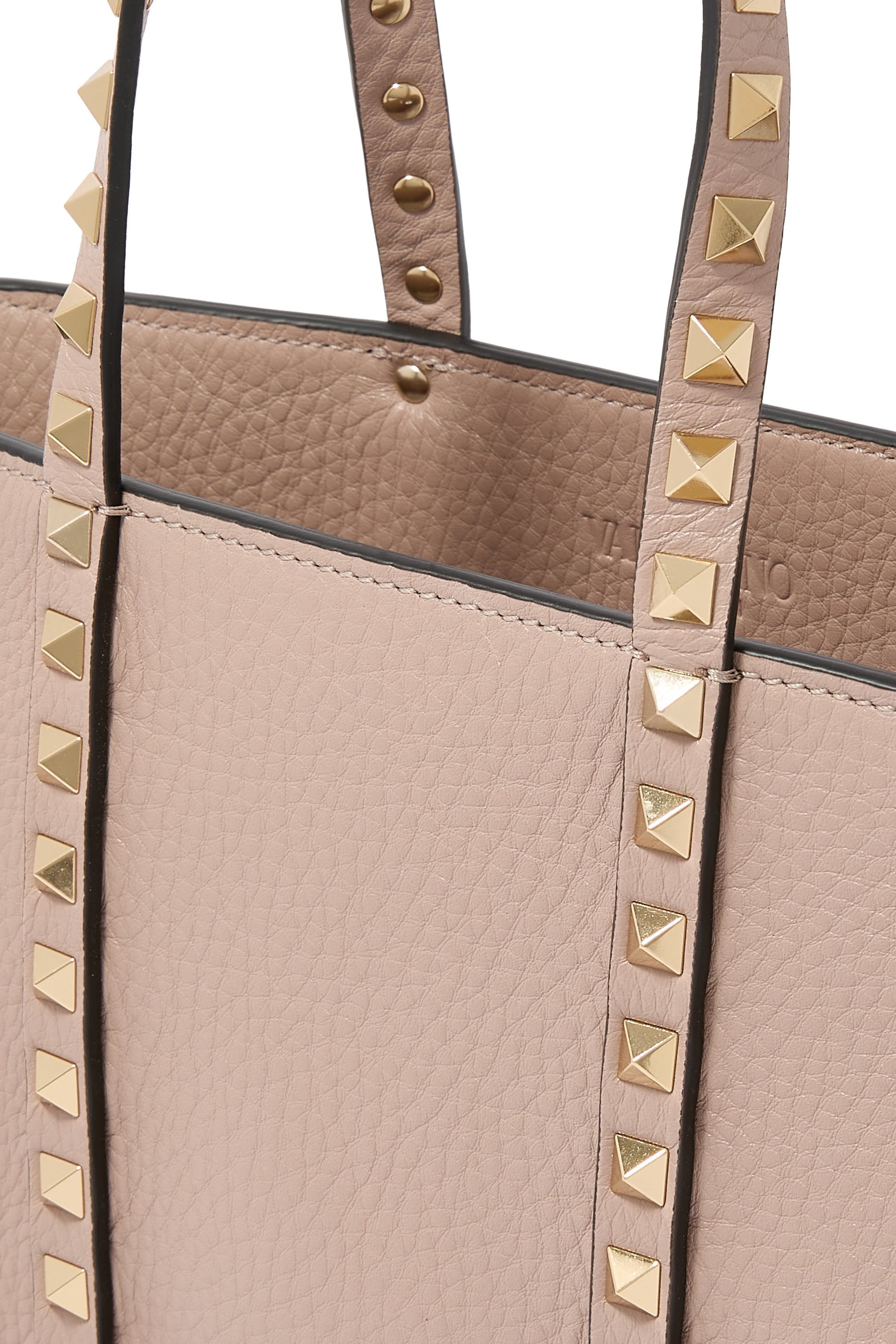 حقيبة يد بحلي هرمية جلد