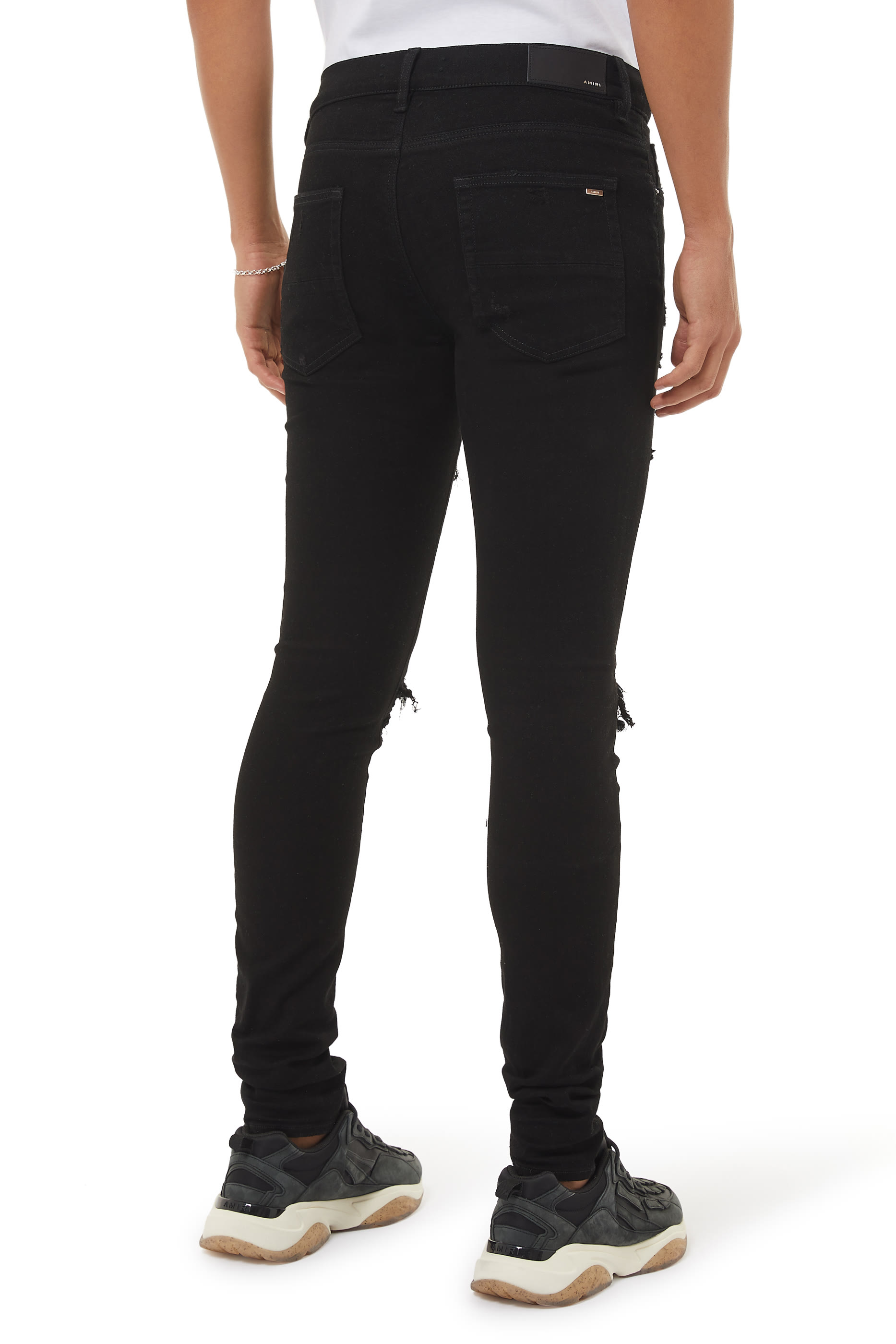 بنطال جينز إم إكس1 بتصميم ممزق