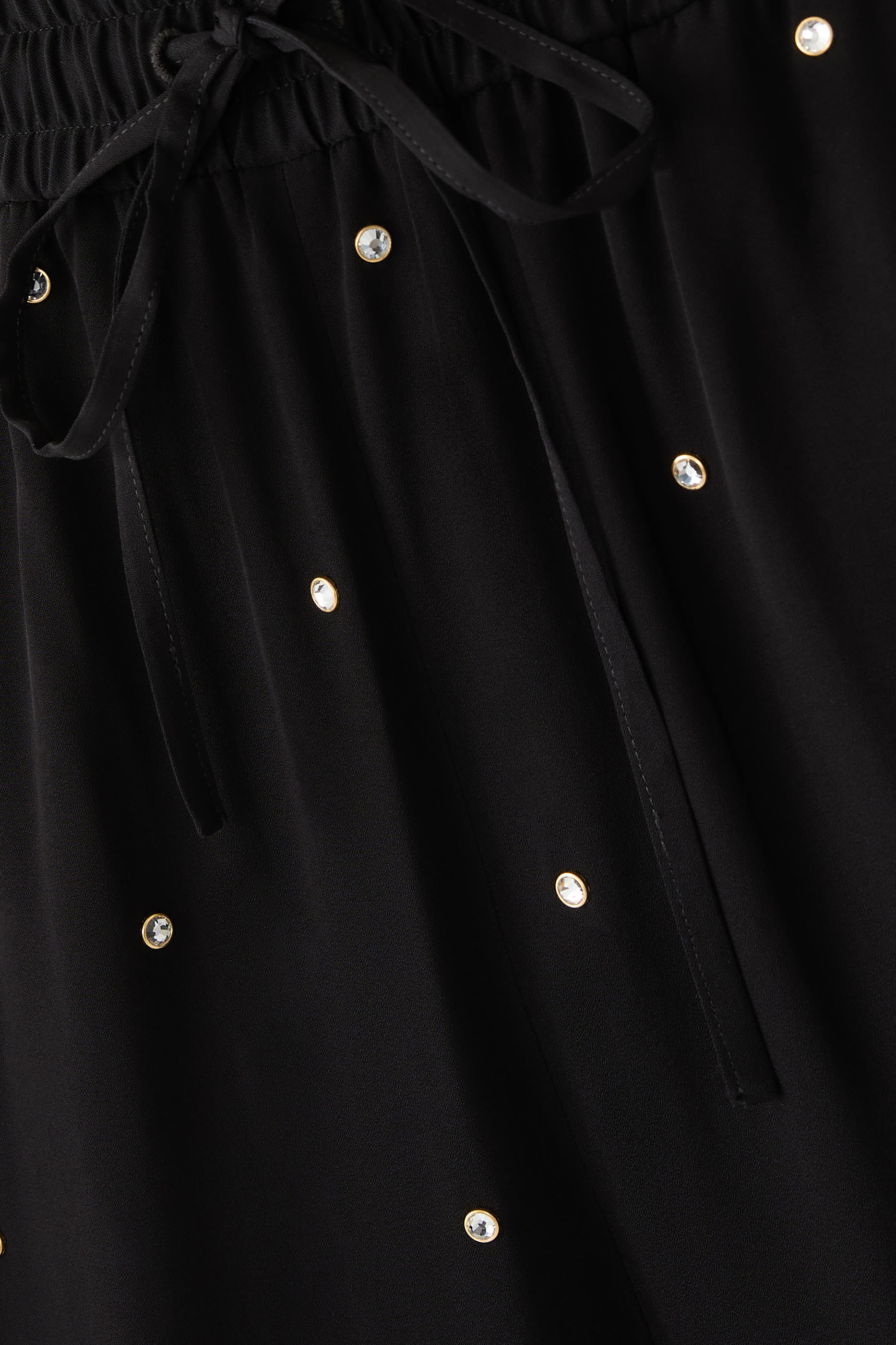 بنطال بقصة ساق واسعة بخصر مرتفع مرصع بالكريستال خالٍ من الرصاص