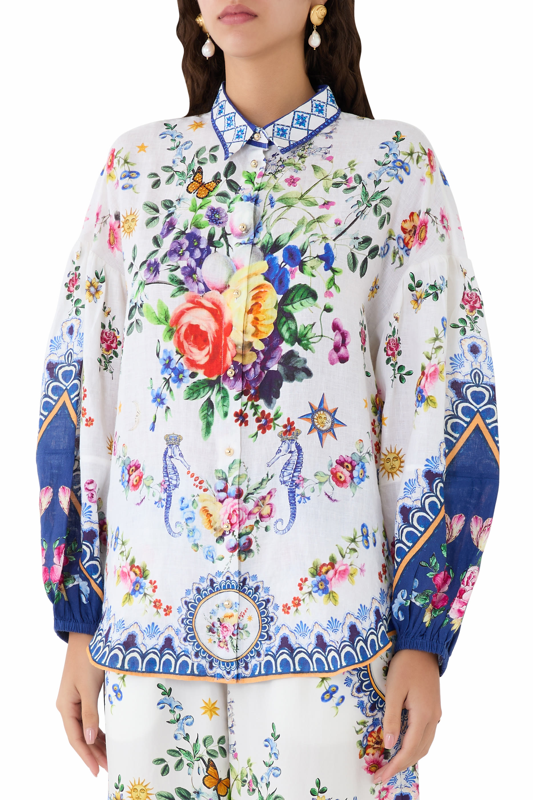 بلوزة بنمط قميص بأكمام منفوخة