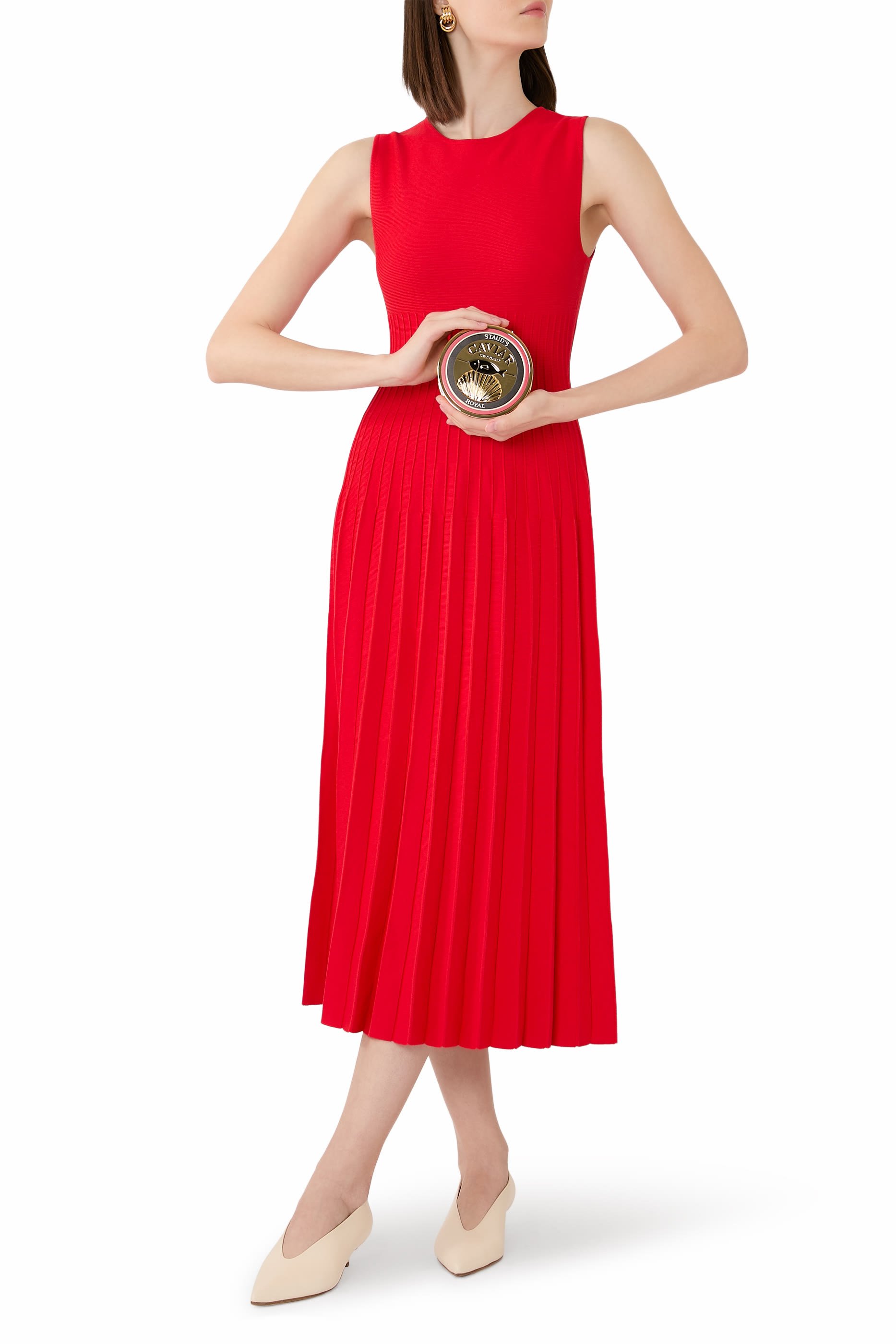 كلاتش بتصميم علبة كافيار معدنية