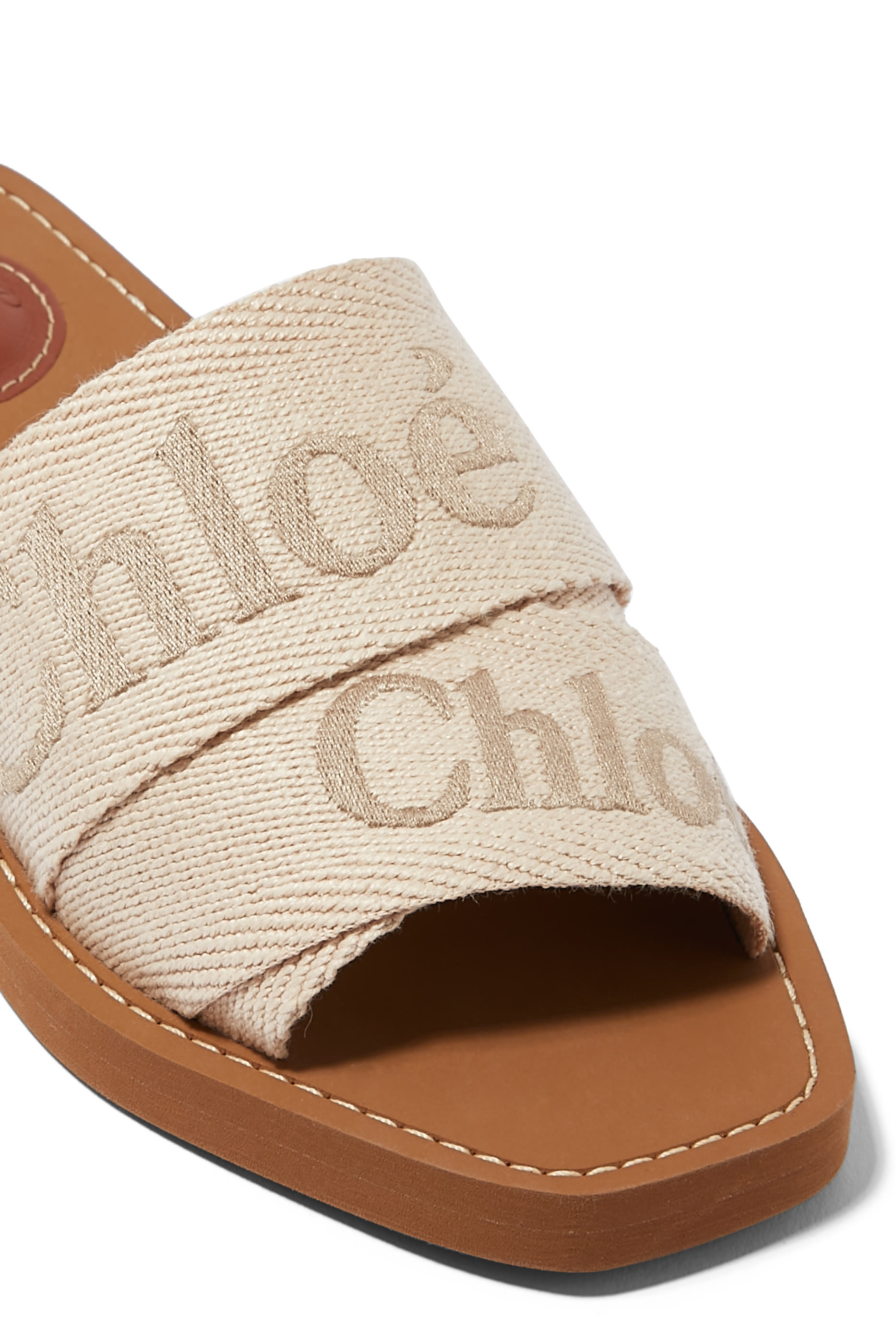 حذاء مفتوح وودي بكعب مسطح كتان