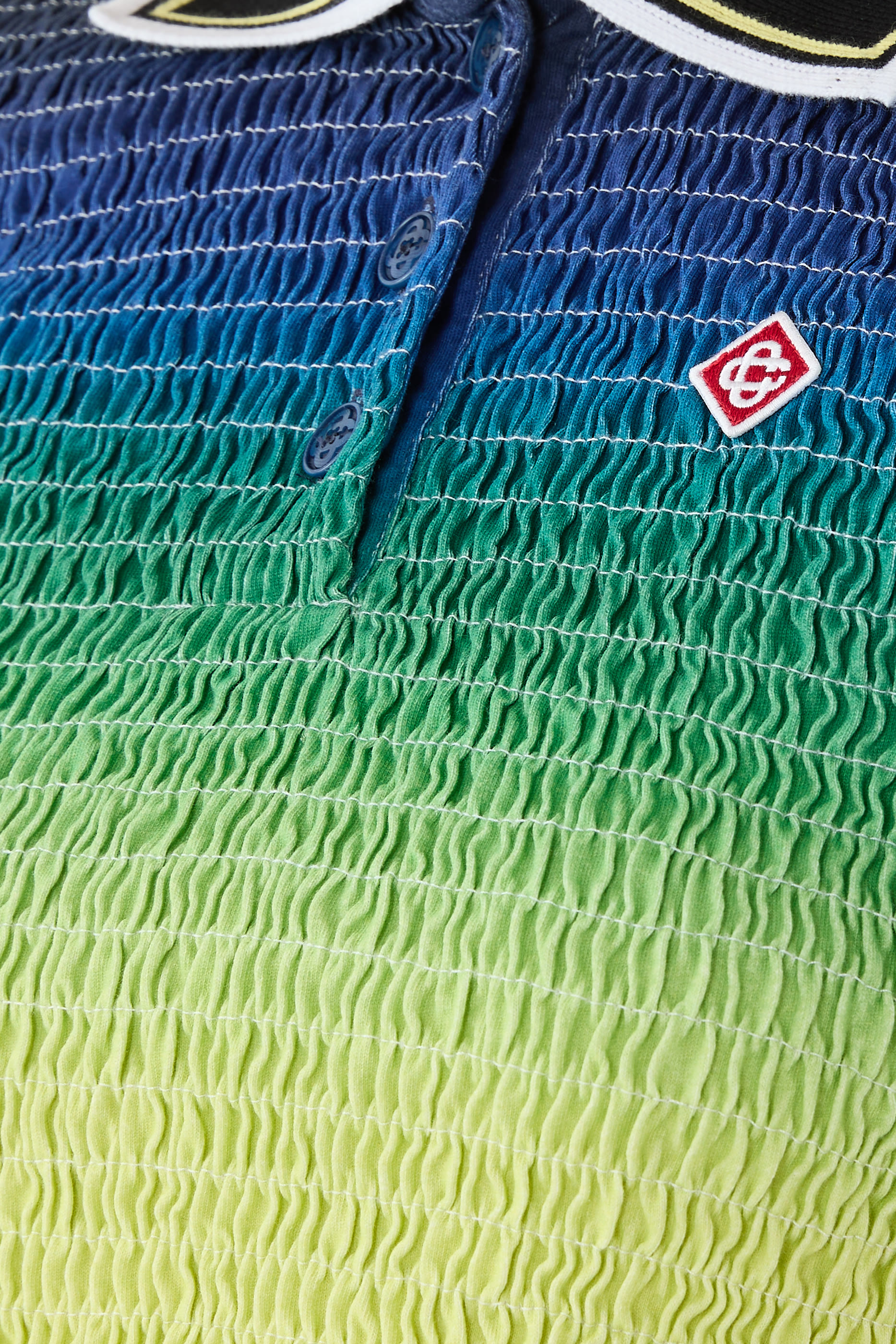 قميص بولو بأكمام قصيرة ولون متدرج