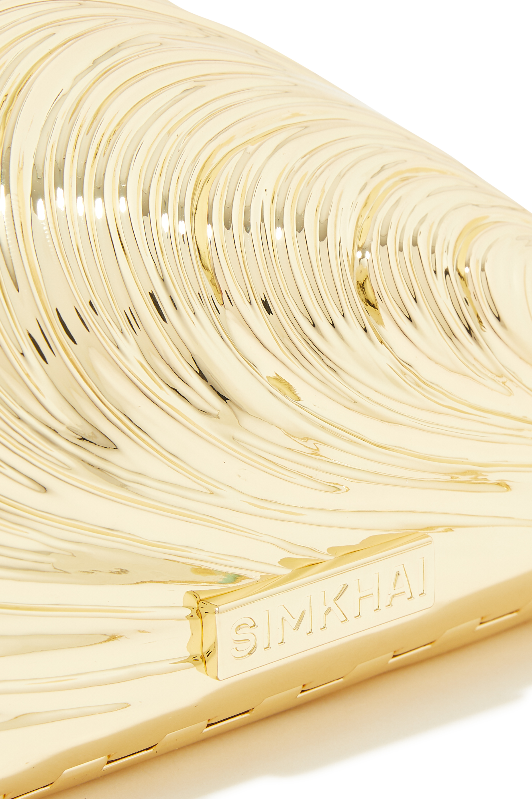 كلاتش بريدجت معدني بتصميم صدفة