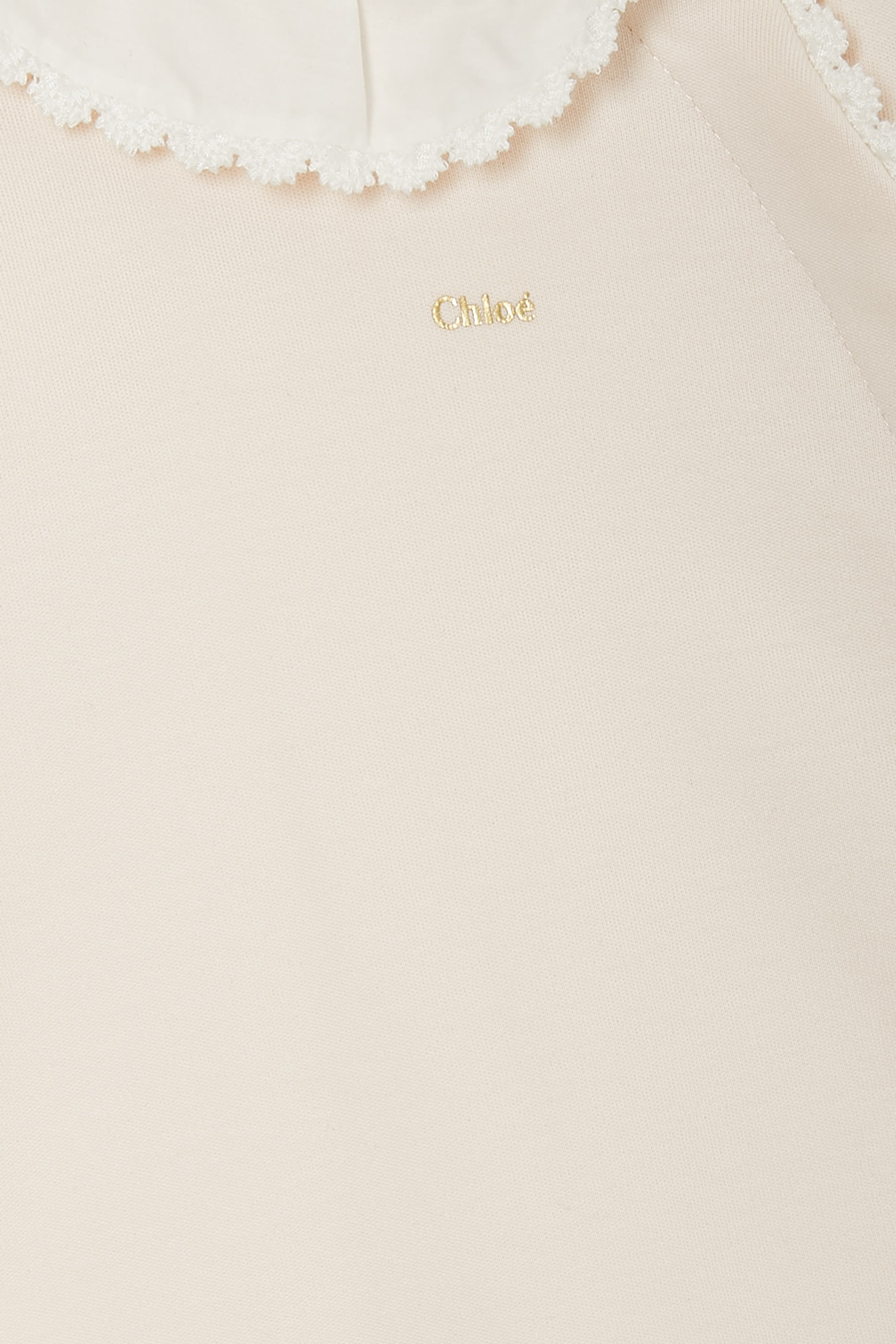 طقم لباس قطعة واحدة ومريلة للأطفال