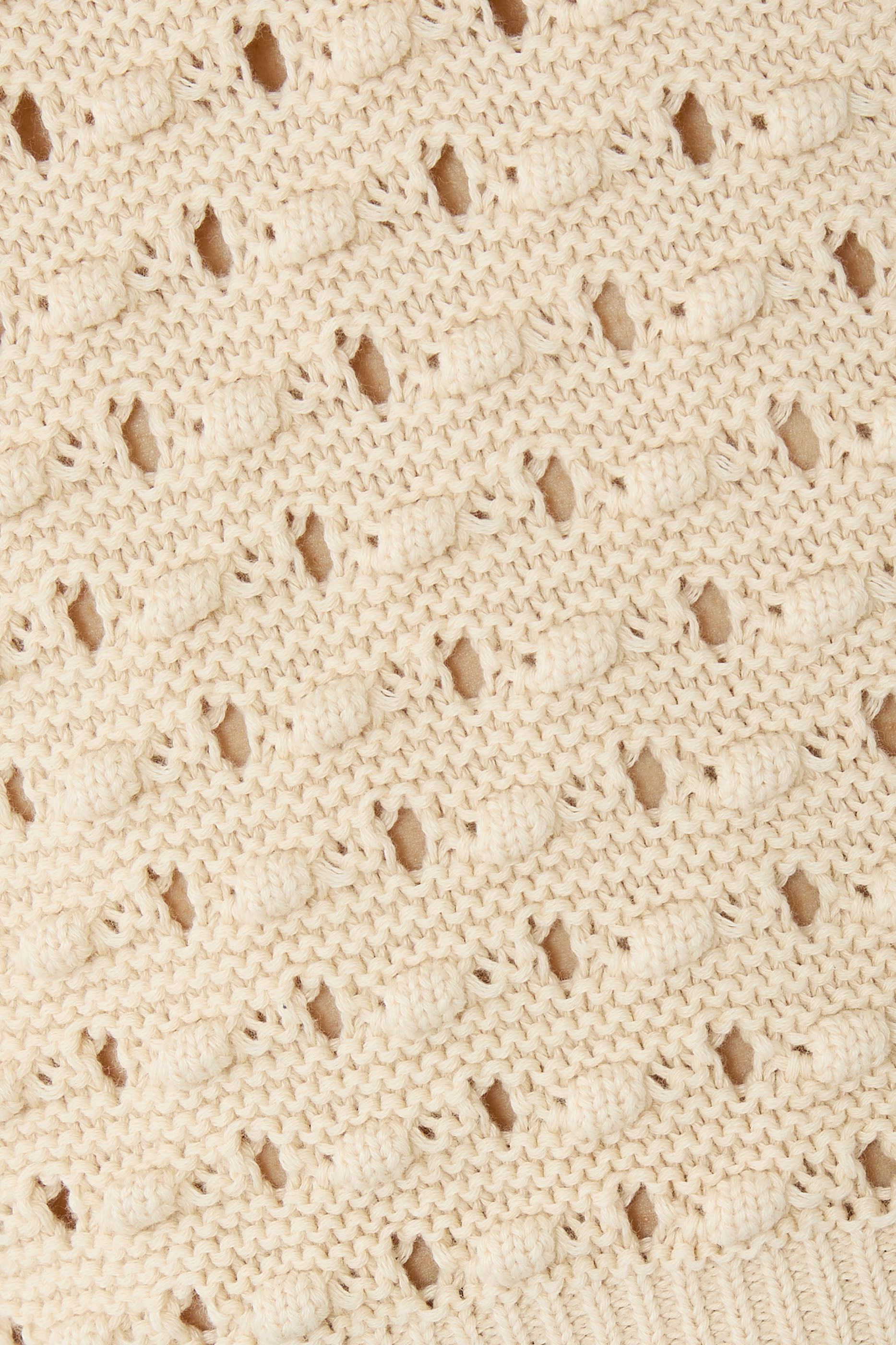 بلوزة بابل بلا أكمام