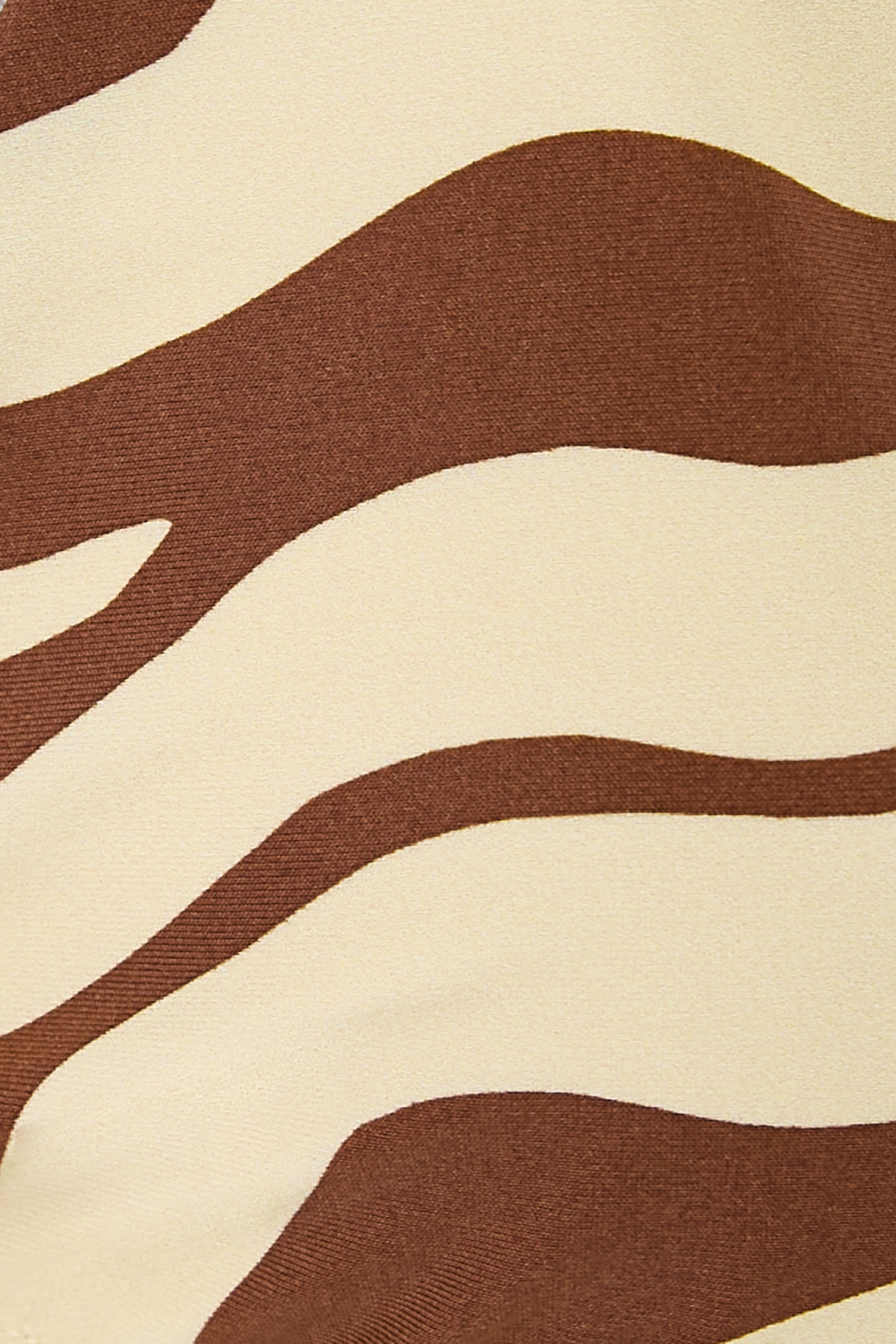 قطعة بيكيني علوية كونيبو بقوالب مثلثة ونقشة زيبرا