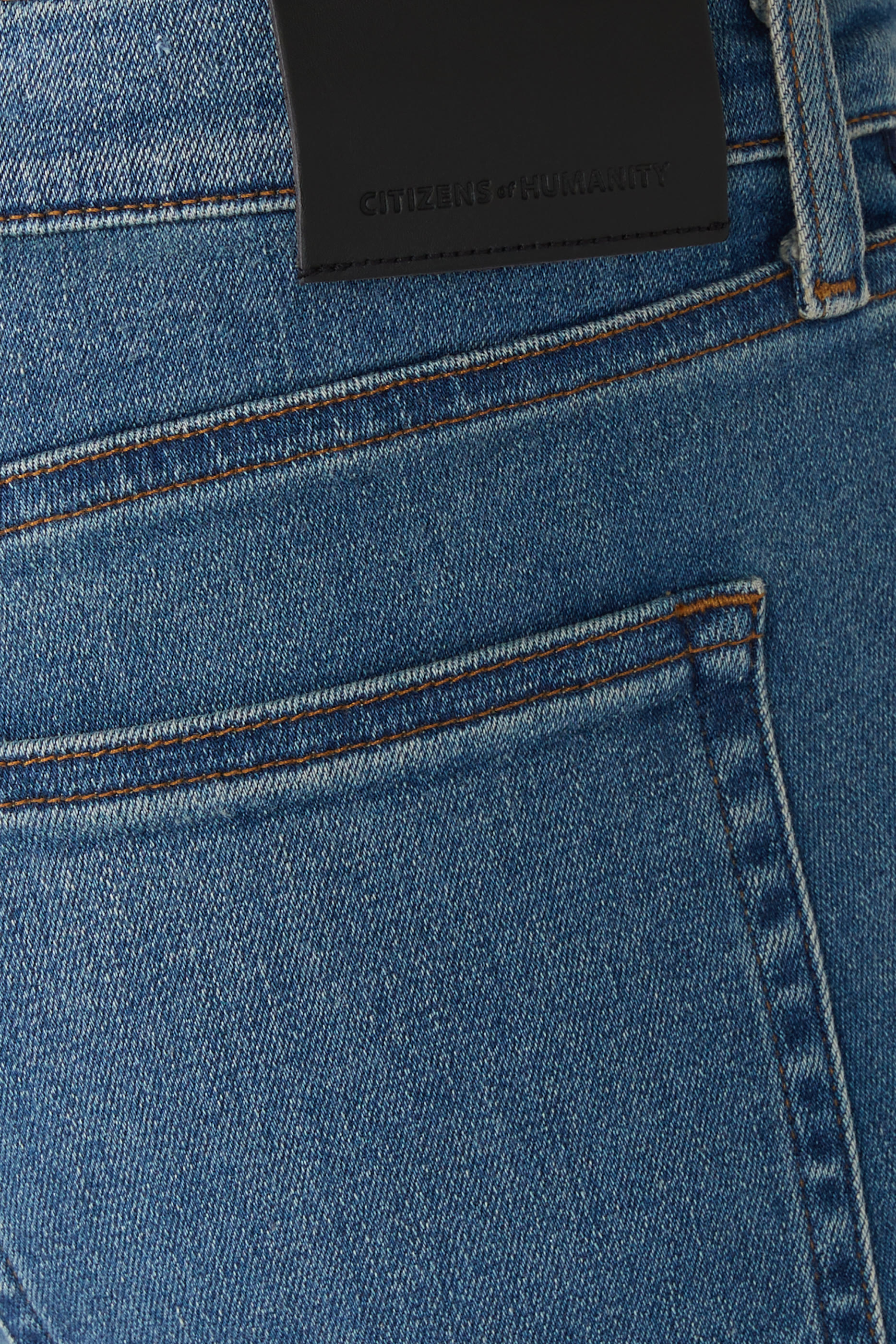 بنطال دنيم لندن بقصة ساق تضيق نحو الأسفل