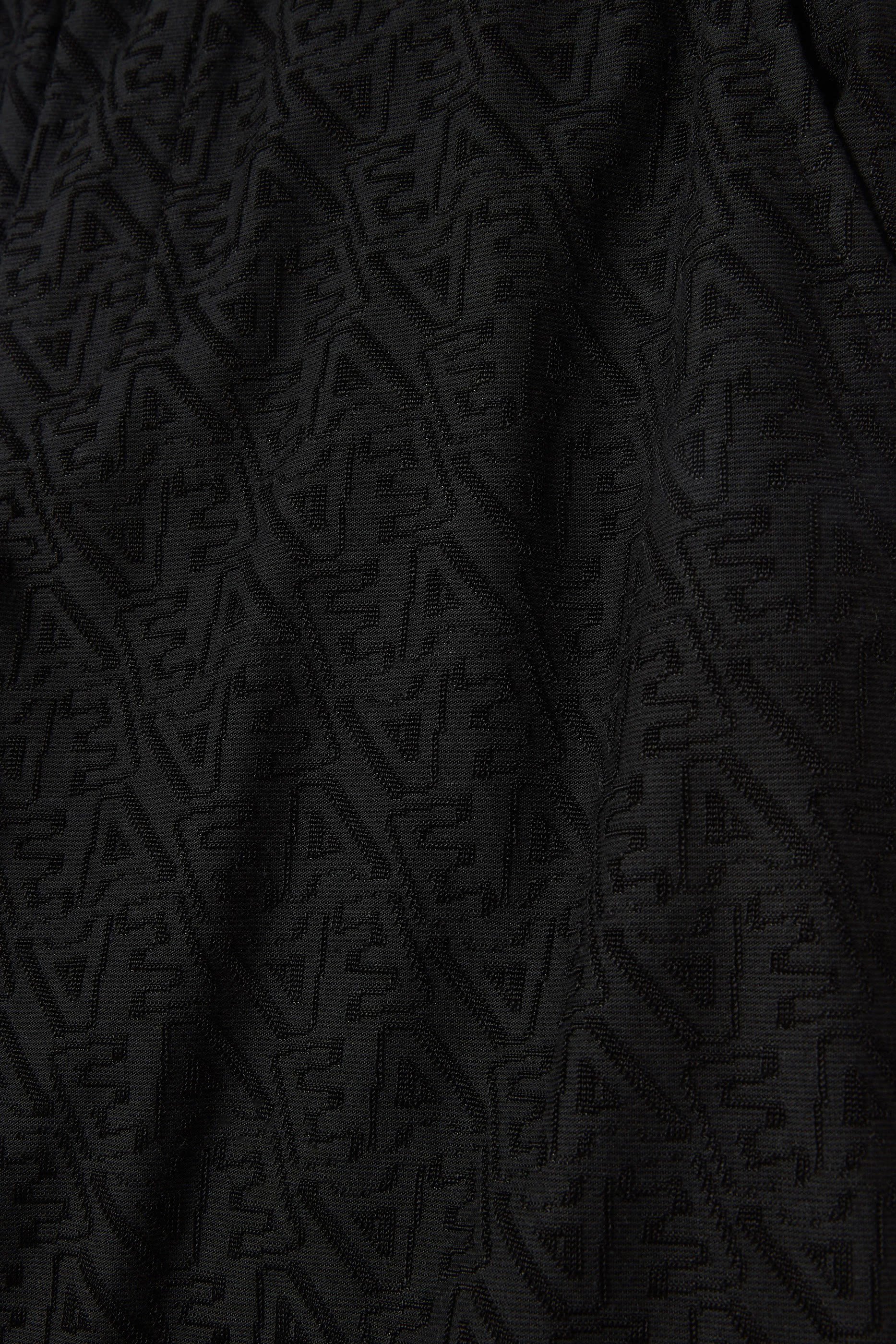 شورت بشعار الماركة للأطفال