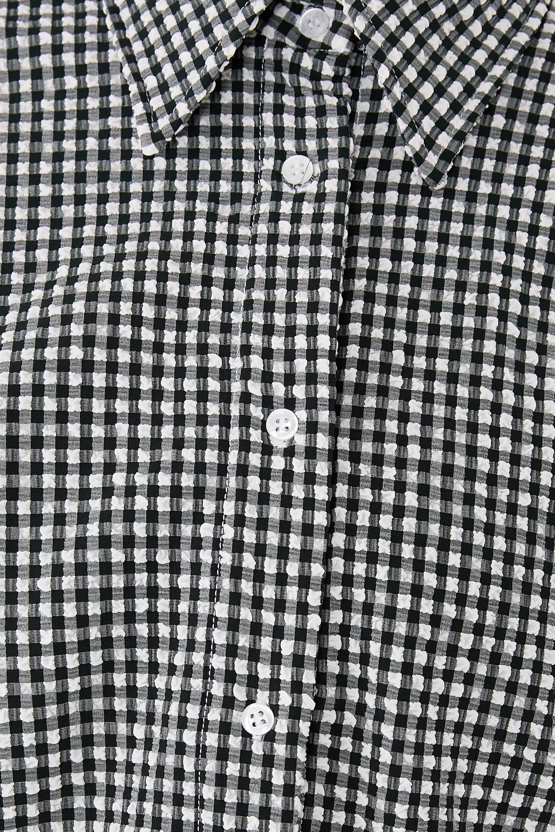 قميص بنقشة مربعة وقصة فضفاضة