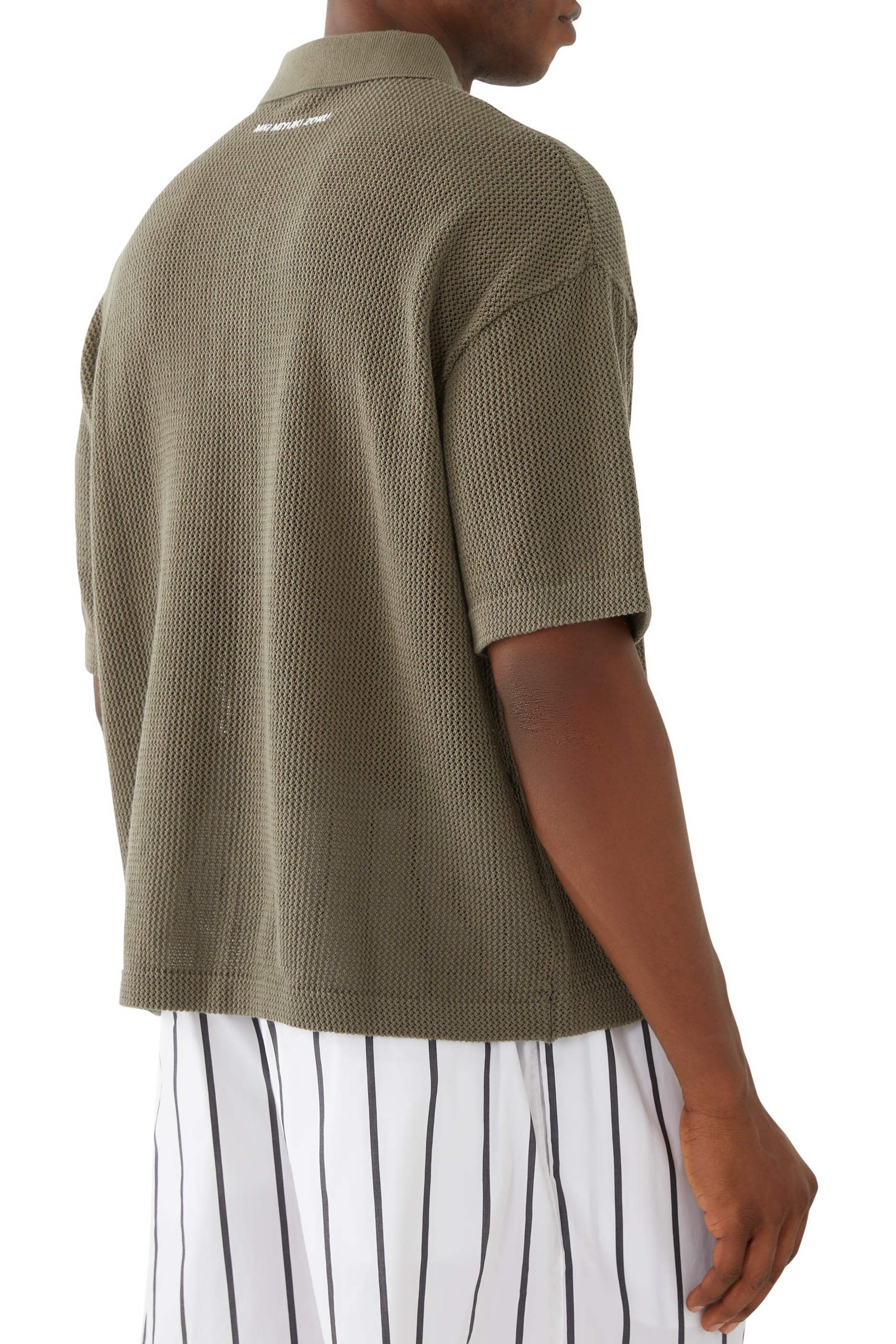 قميص بولو منسوج