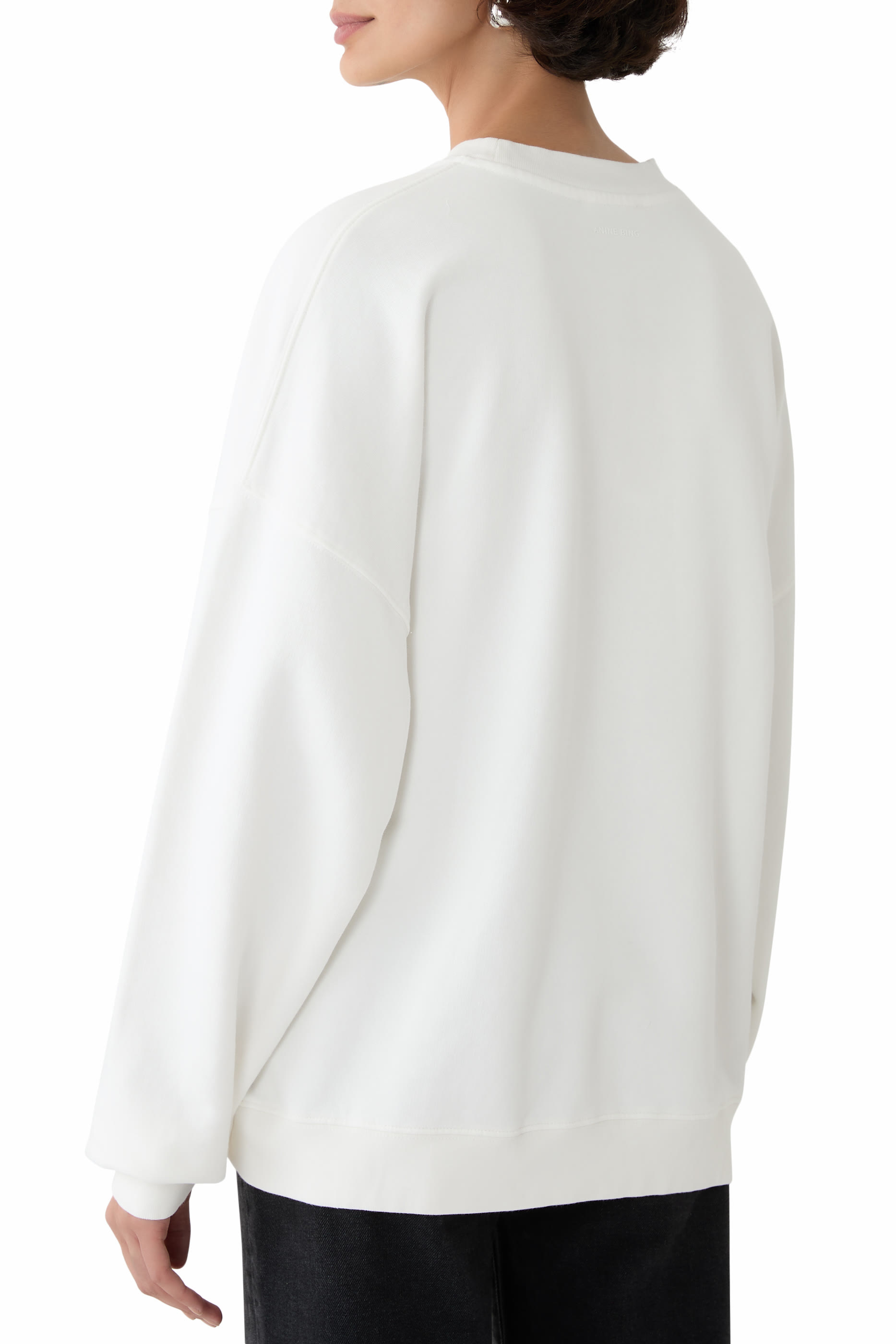 سويت شيرت مايلز بقصة فضفاضة وحروف شعار الماركة