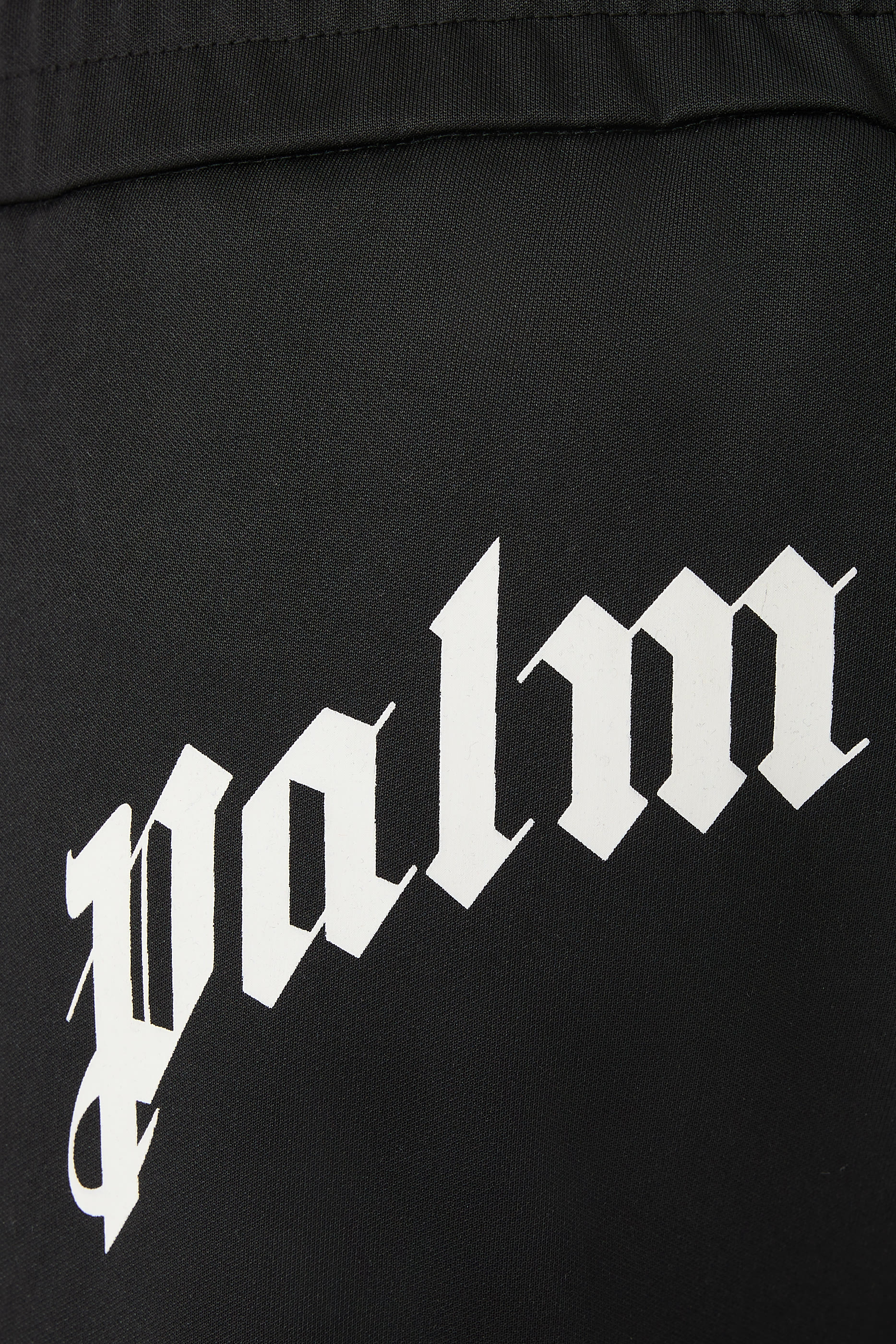 بنطال رياضي بشعار الماركة المقوس