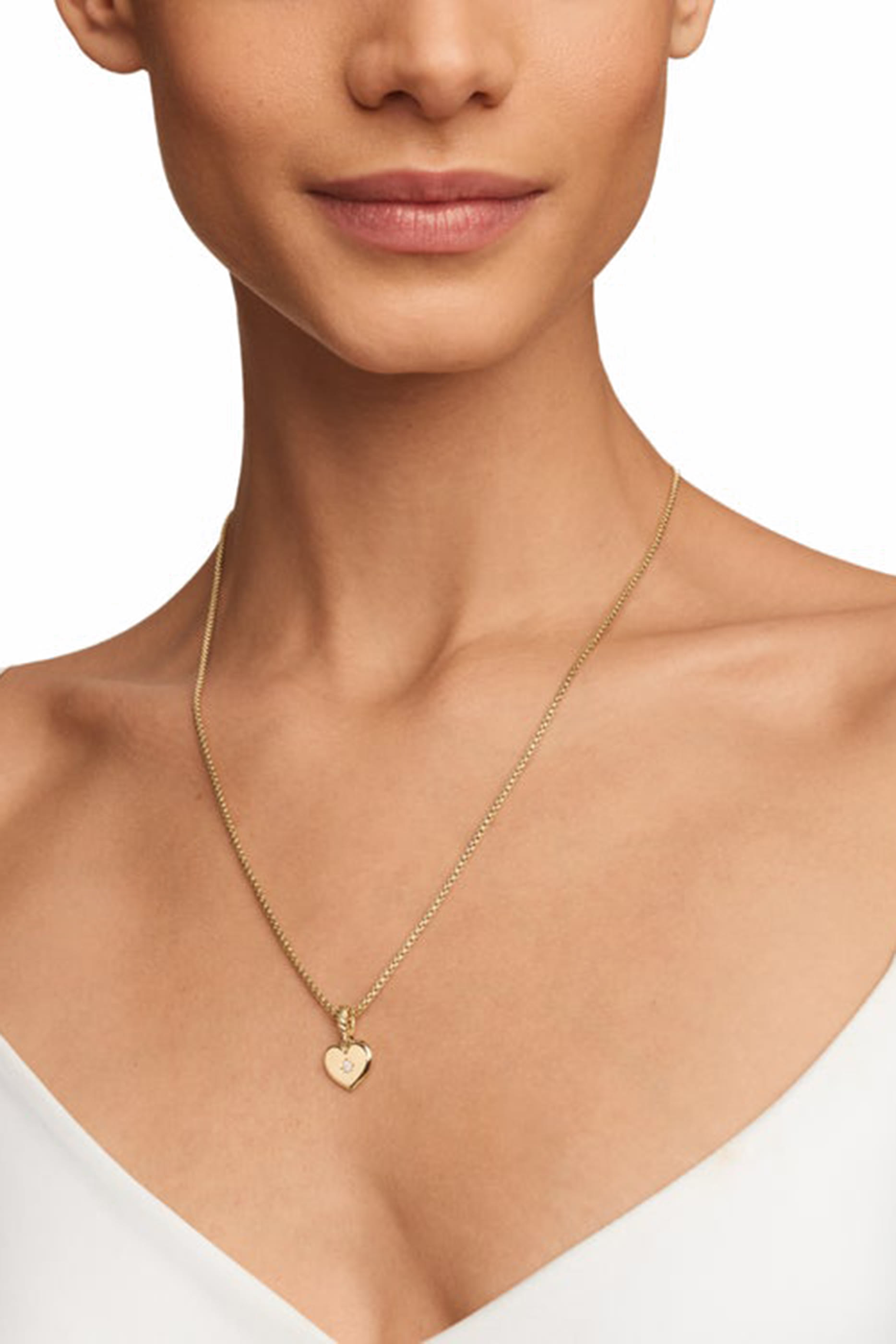 دلاية بتصميم قلب بنقشة بوصلة مرصعة بالماس، ذهب أصفر عيار 18