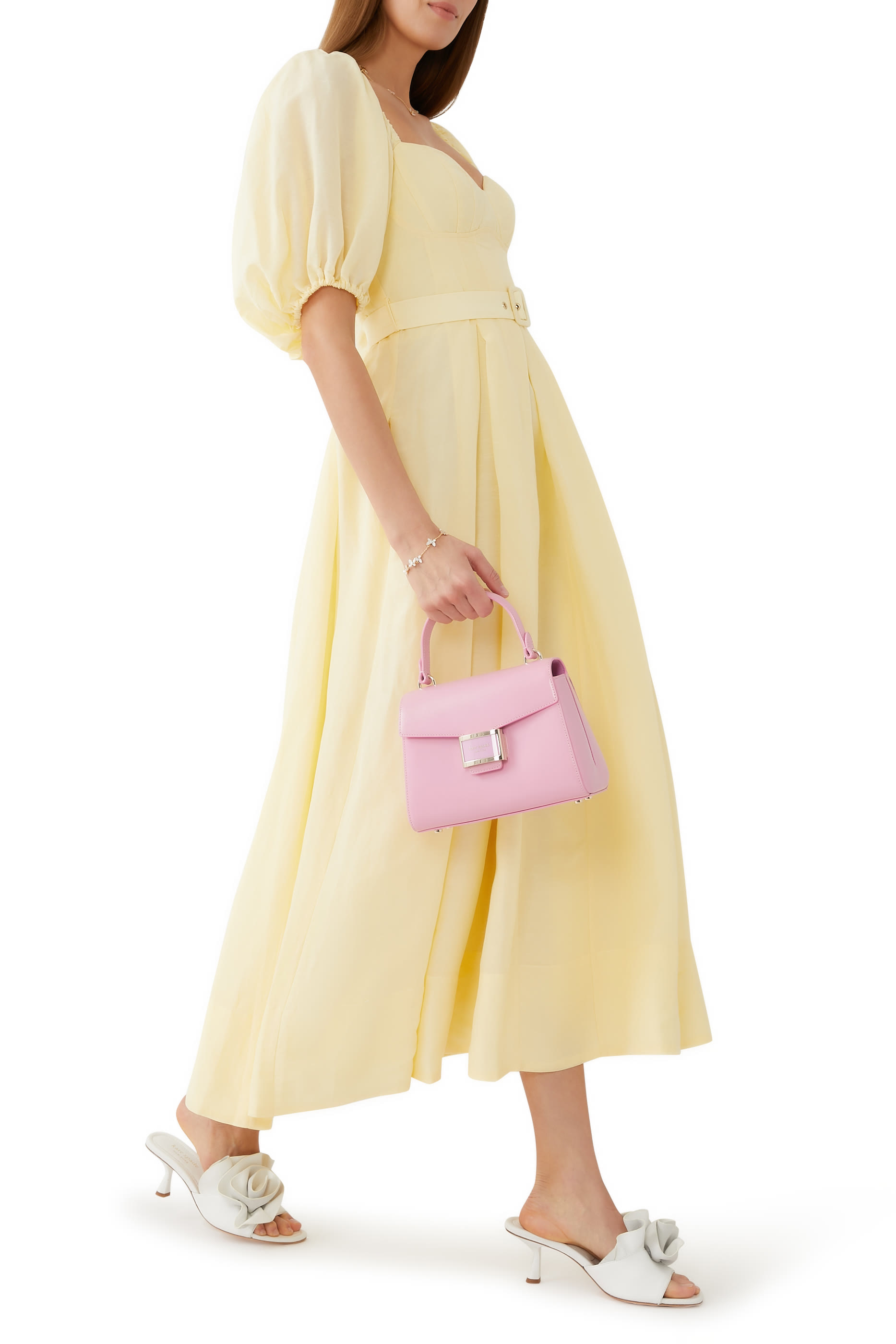 حقيبة كاتي صغيرة بيد علوية جلد لامع