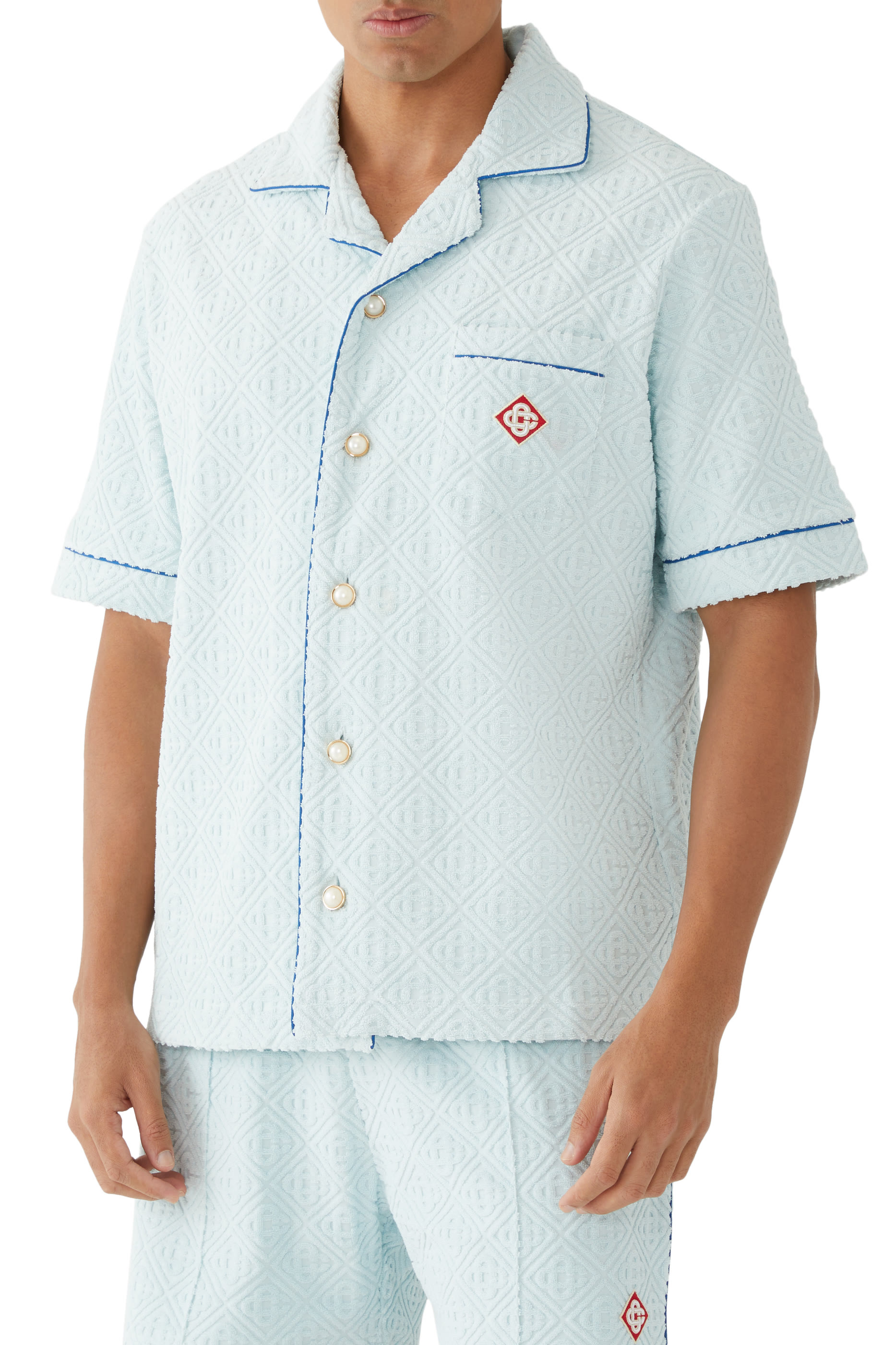 قميص بشعار الماركة قماش تيري