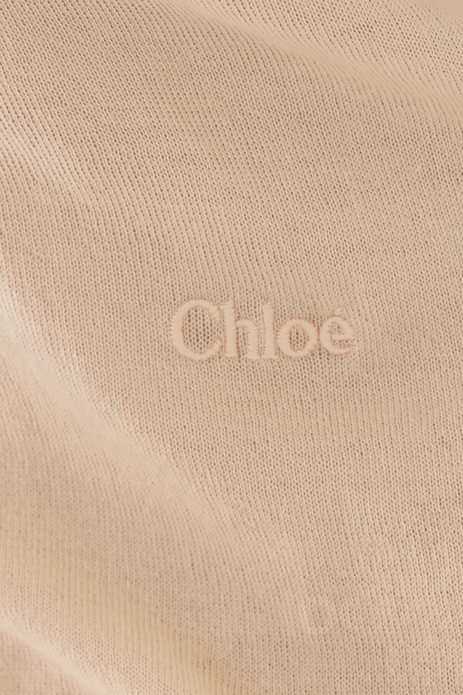 بلوزة بلا أكمام بحمالات رفيعة