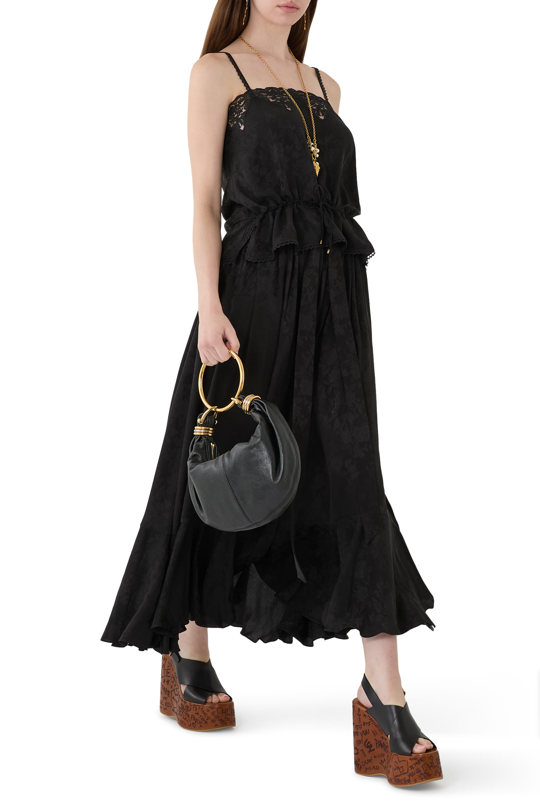 تنورة متوسطة الطول بكشكش جاكار حرير