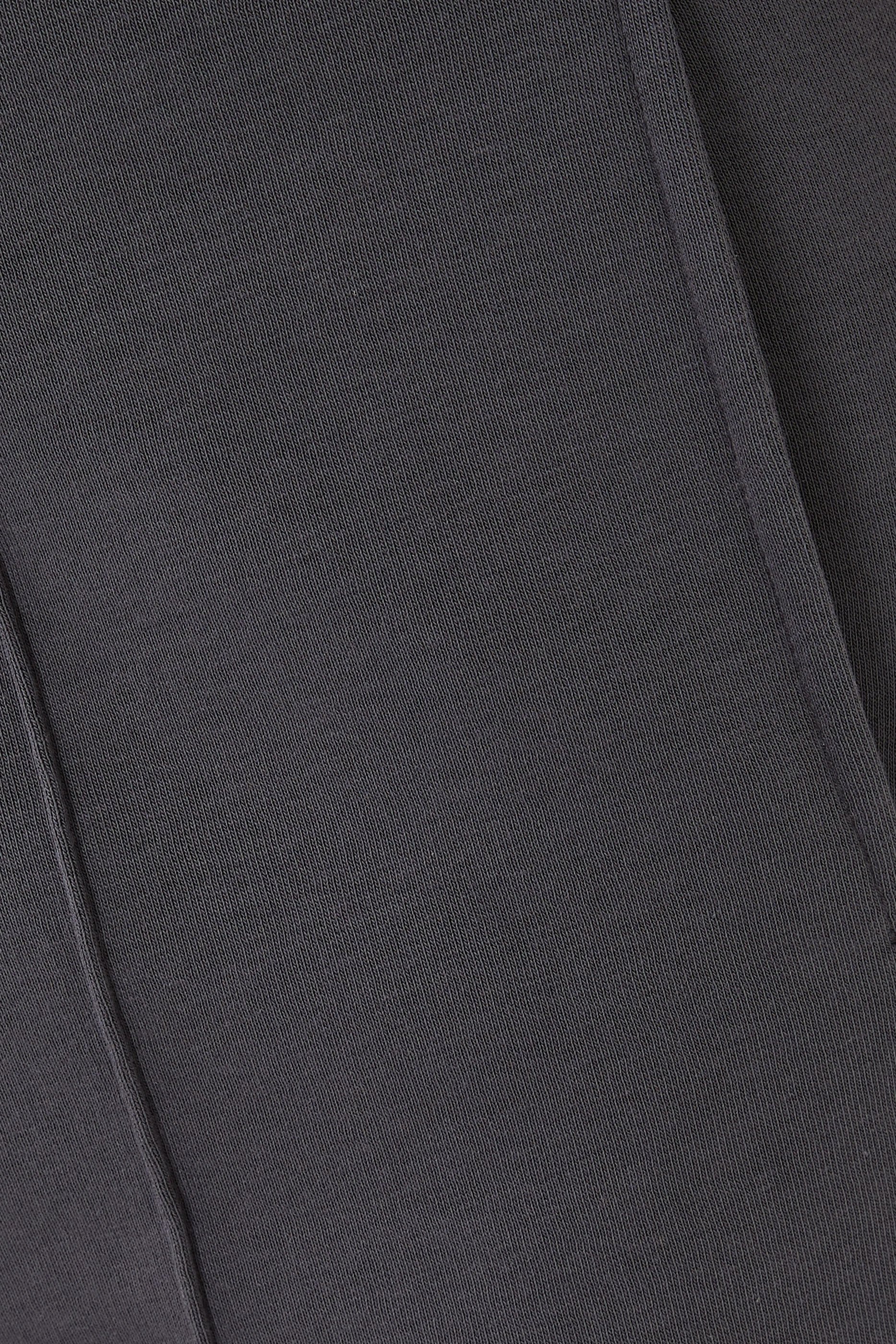 بنطال بقصة ساق واسعة بحواف ملفوفة