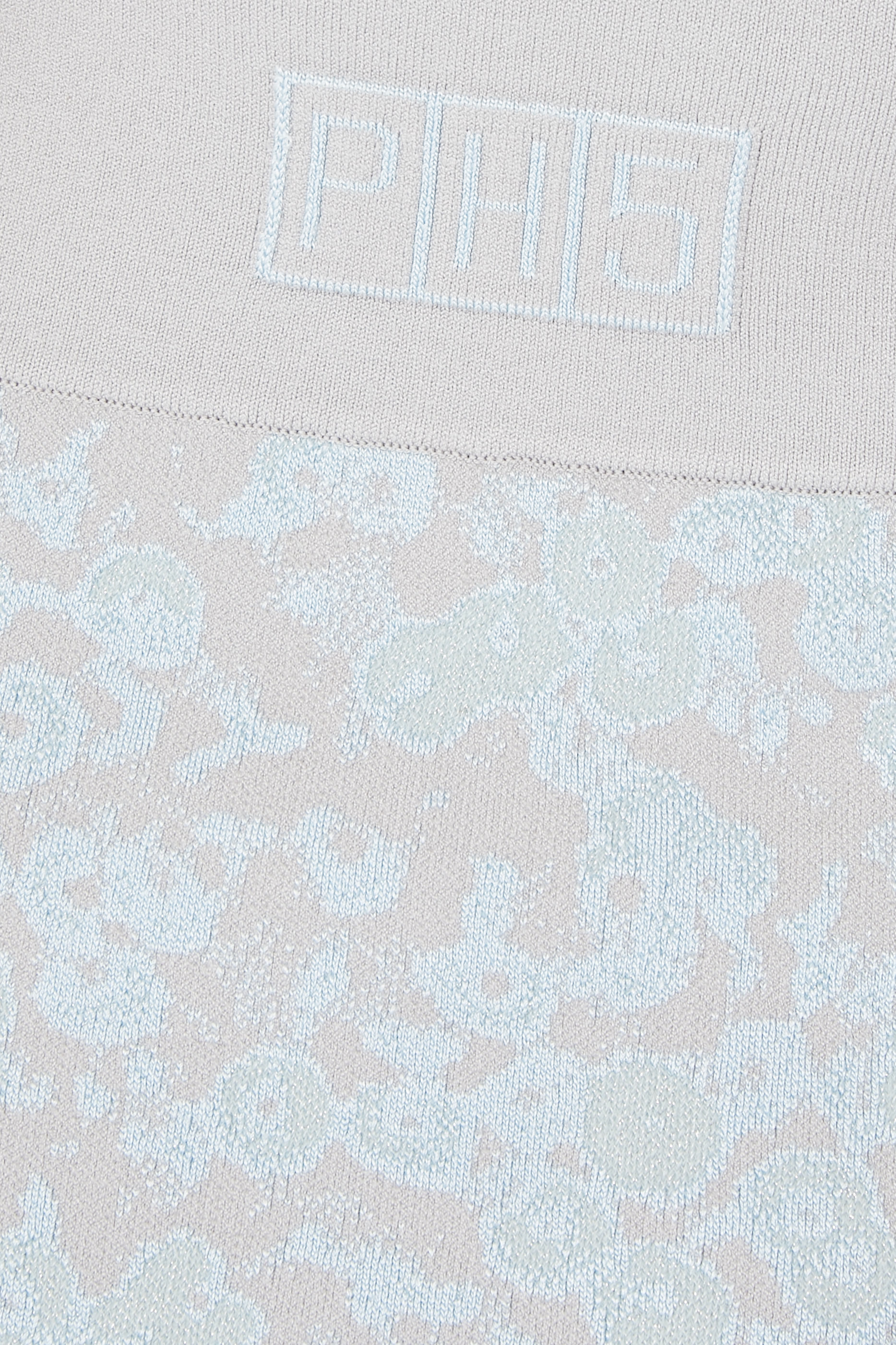 تنورة اربور قصيرة بحافة متموجة مطرزة بالترتر