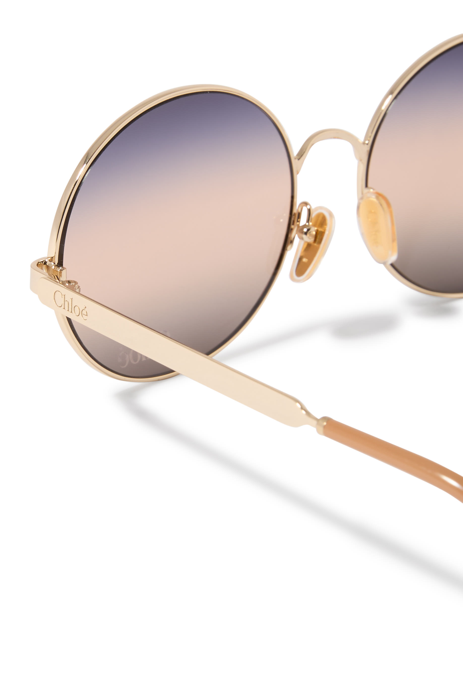 نظارة شمسية الي بإطار مستدير