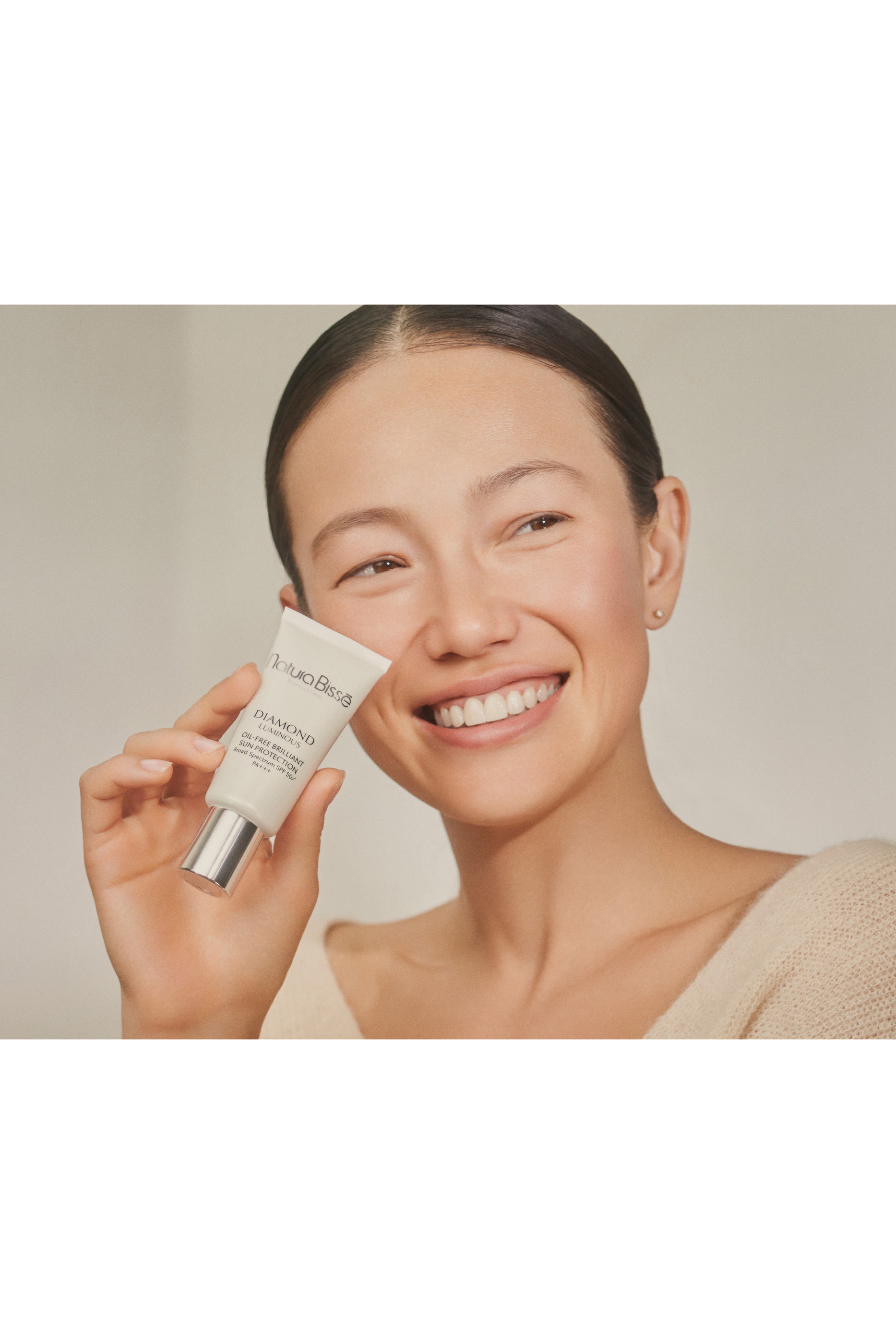 واقي الشمس دياموند وايت SPF 50+&rlm;&rlm;