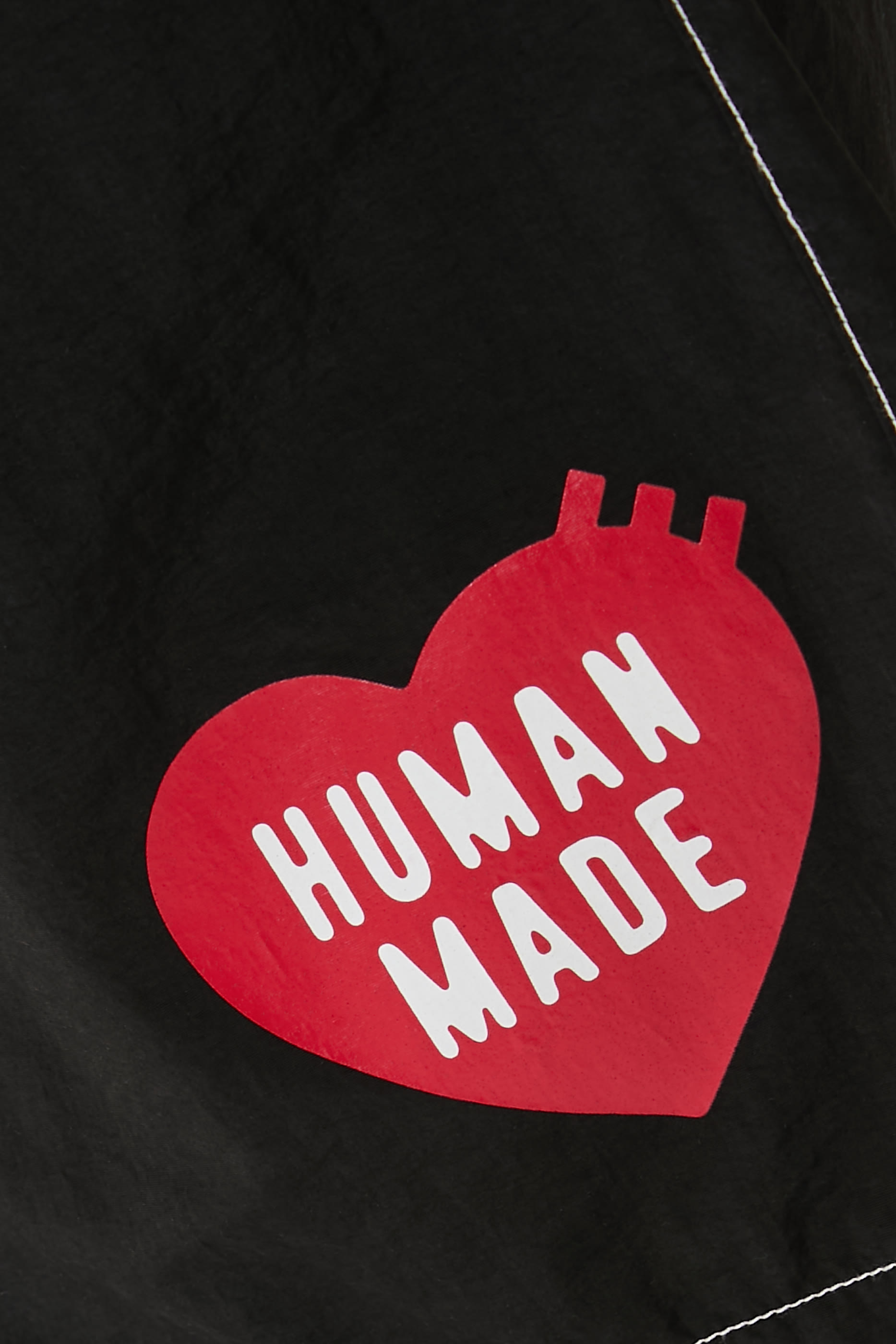 شورت سباحة بشعار الماركة