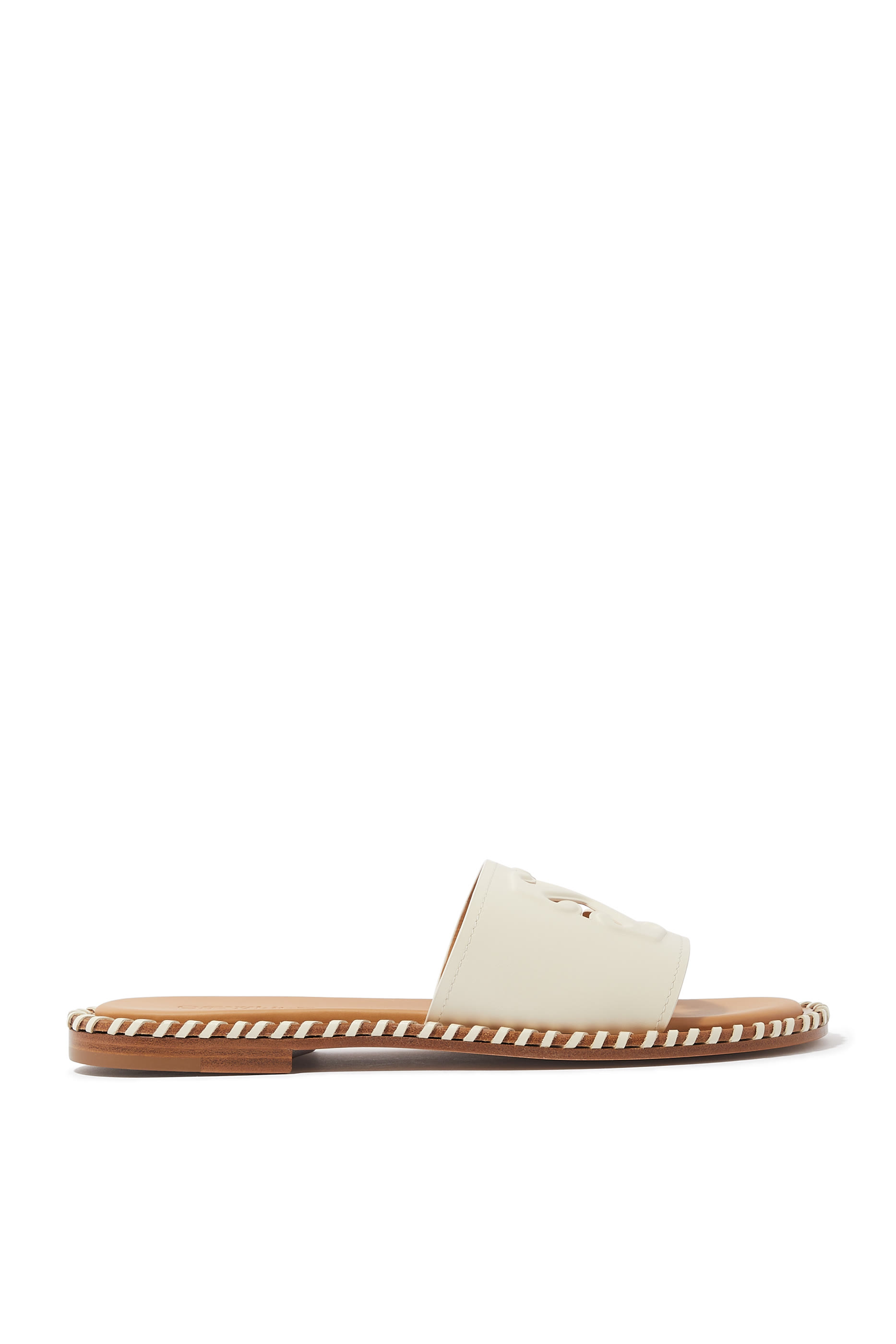 حذاء خفيف جلد بتفاصيل ملفوفة وشعار الأسهم