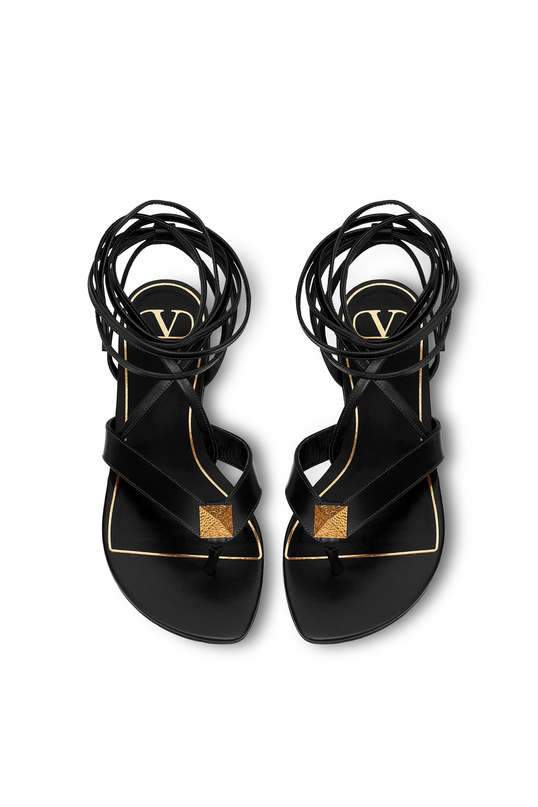 صندل بسيور ملفوفة وحلي هرمية ونعل مسطح جلد