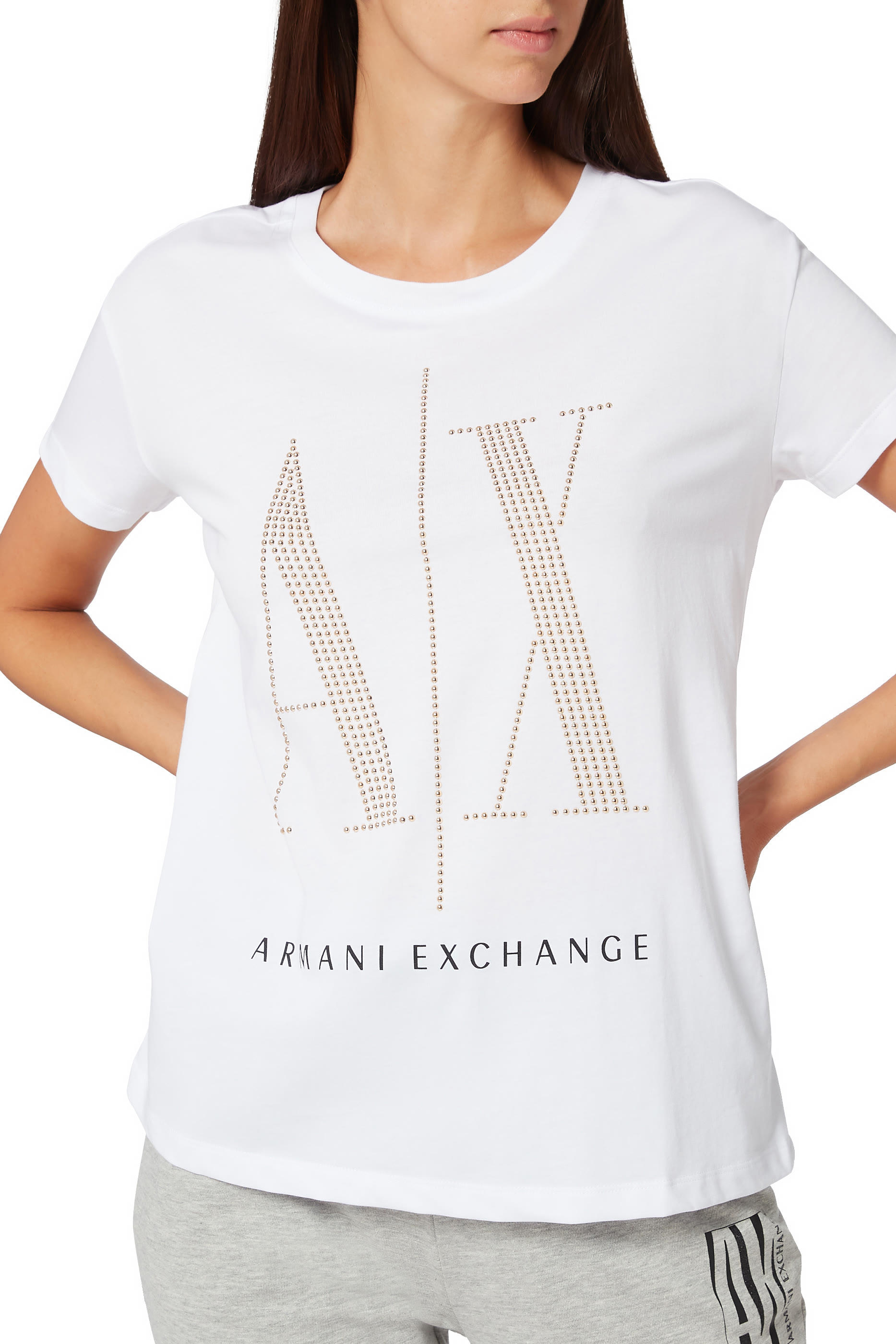 تي شيرت أيكون بحلي معدنية على شكل شعار الماركة