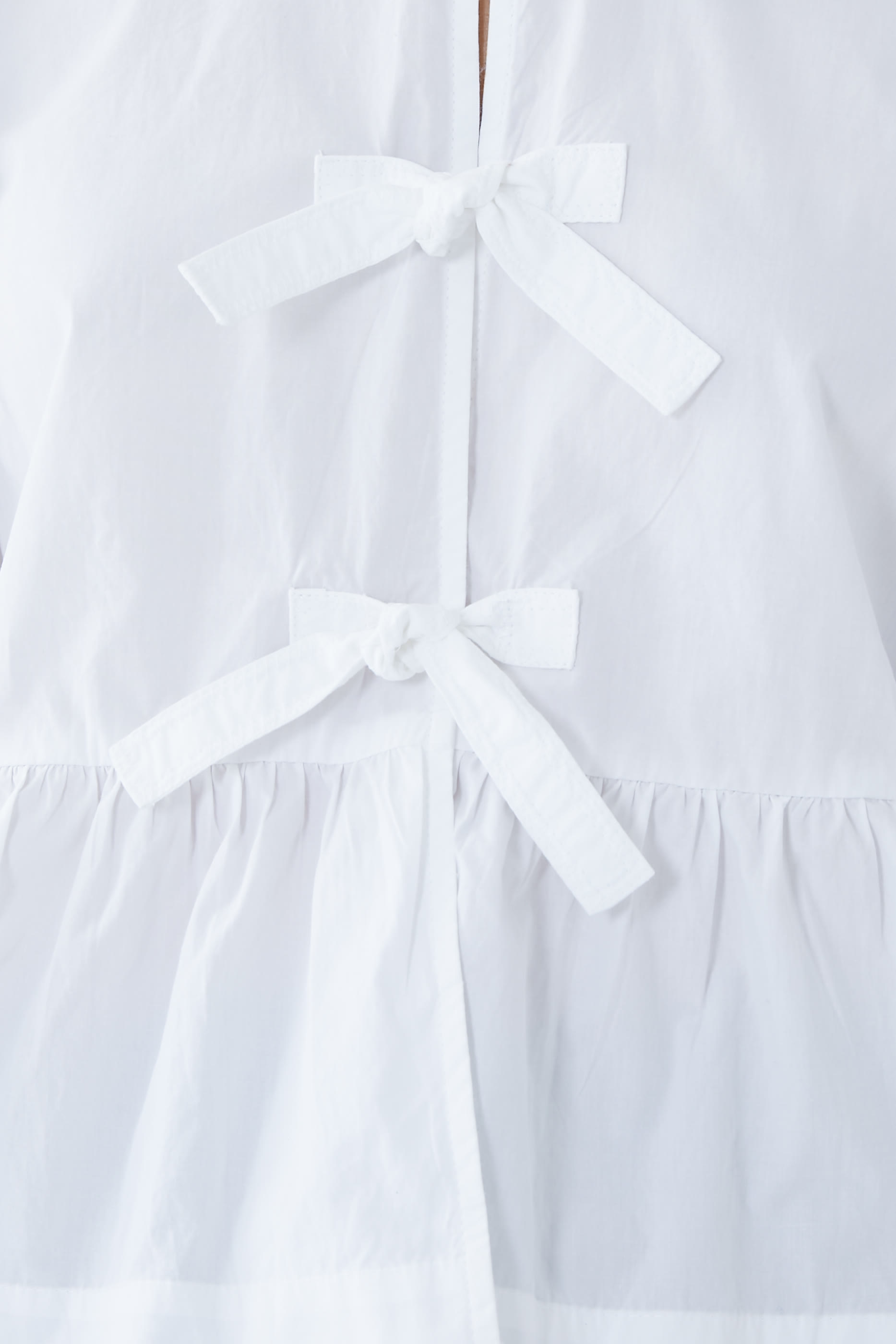 بلوزة بحافة جرس قطن بوبلين