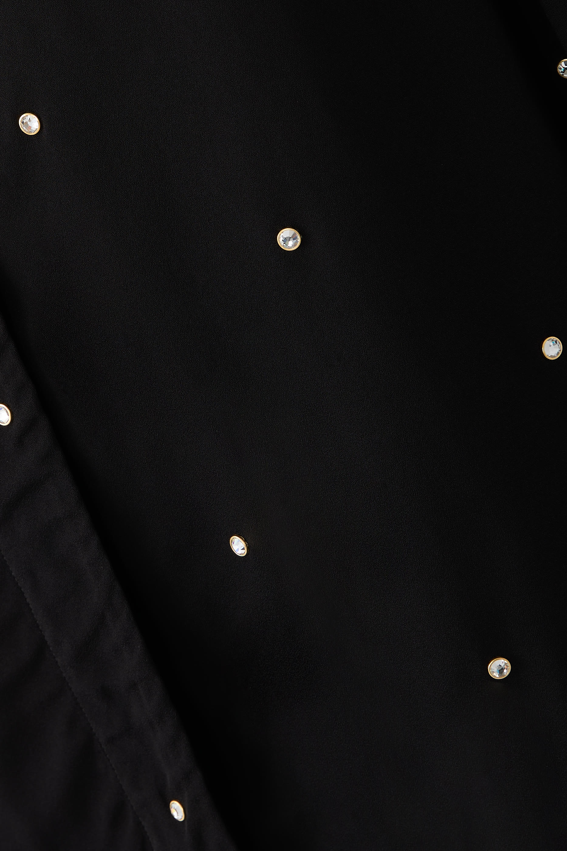 قميص بقصة فضفاضة مطرز بالكريستال