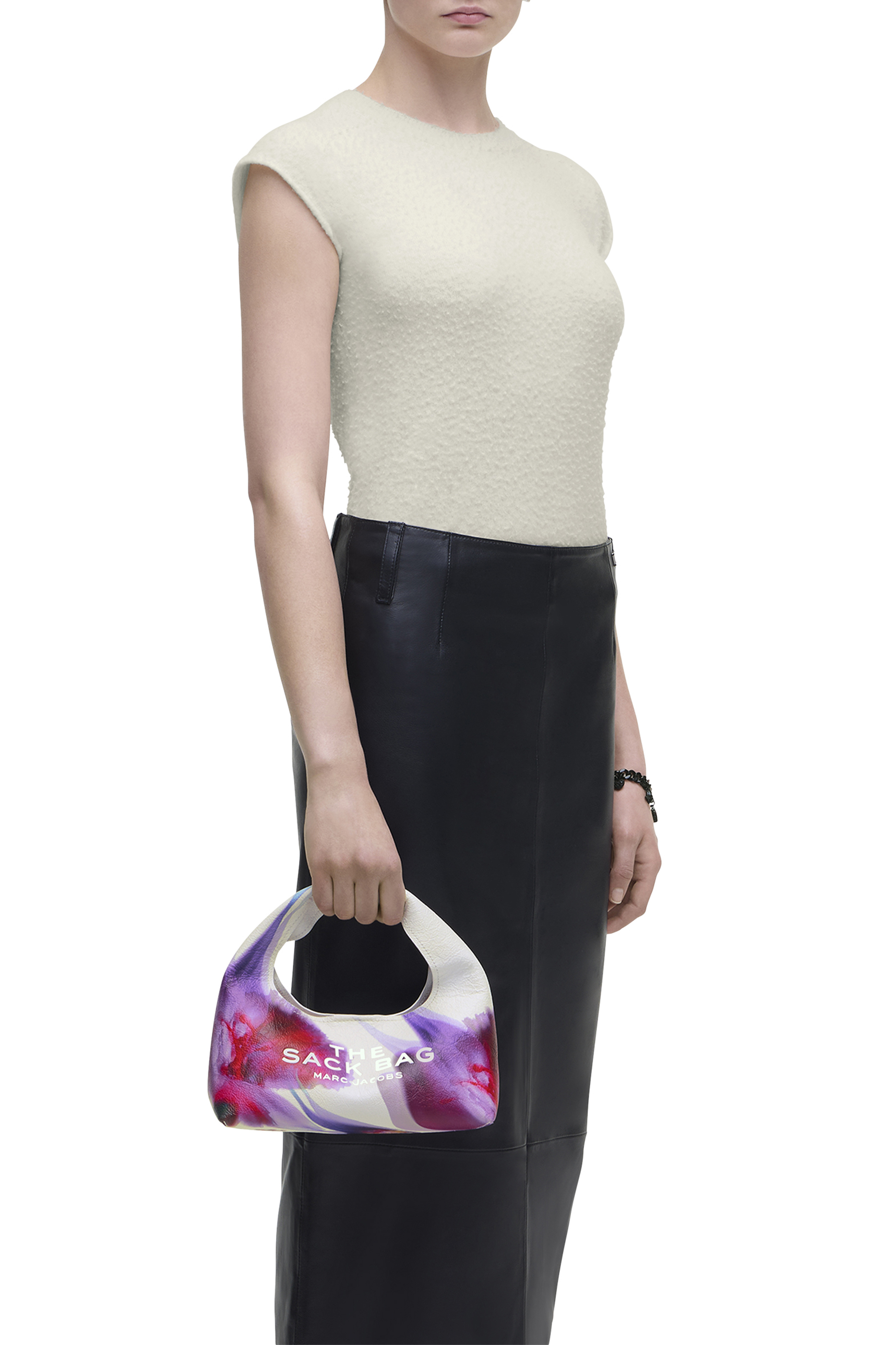 حقيبة صغيرة مزينة بزهور جلد