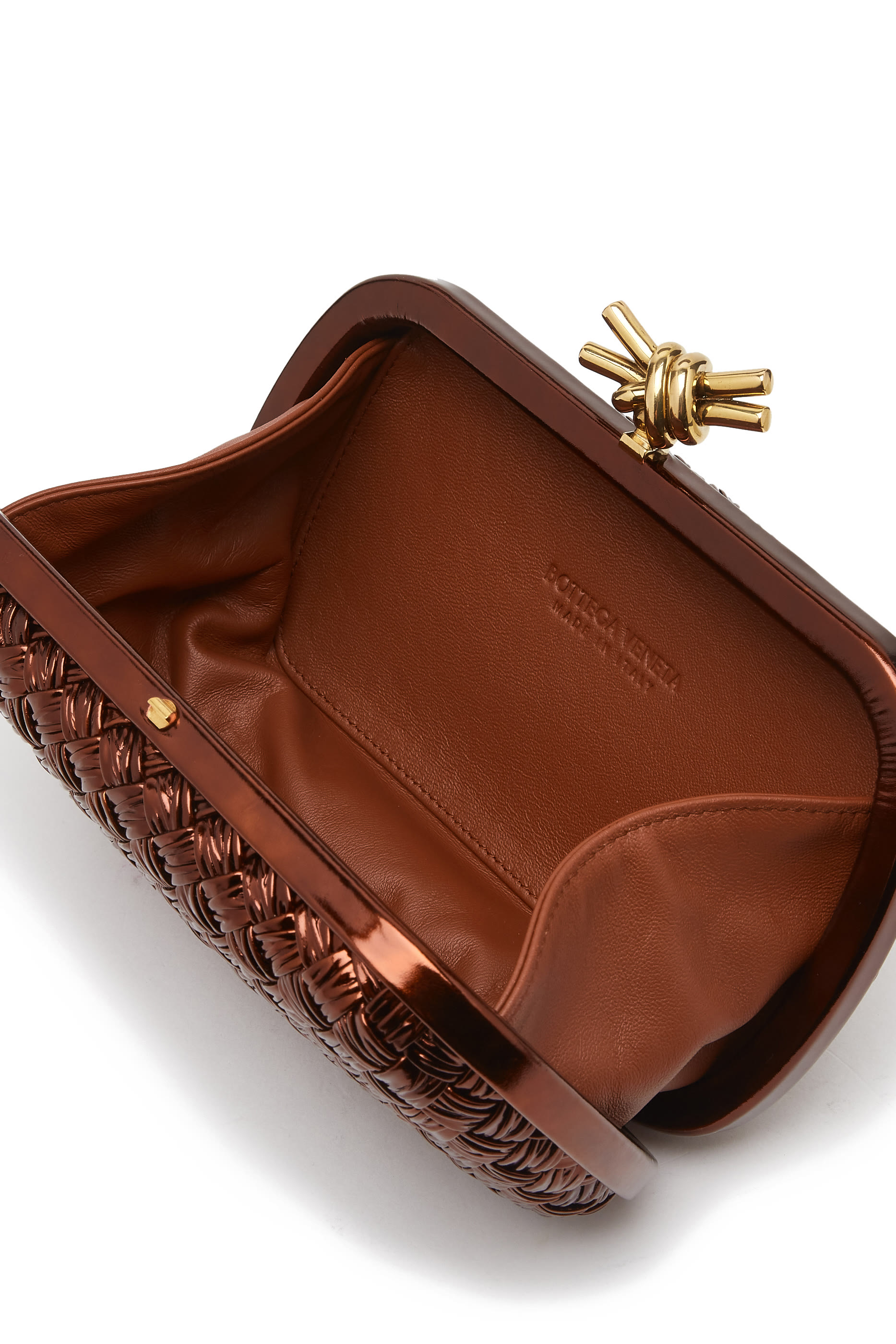 كلاتش بتصميم مجدول وعقدة جلد