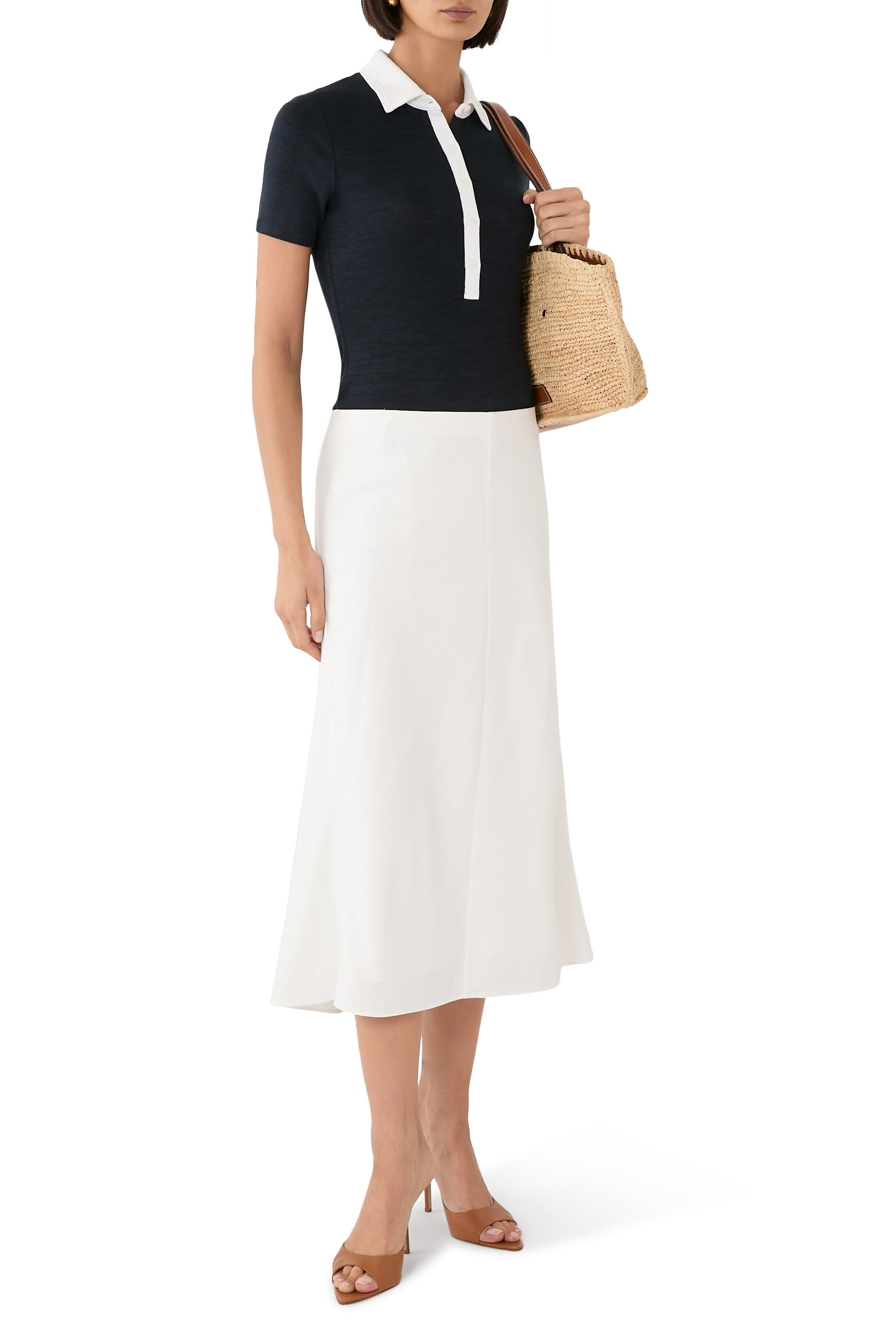 قميص بولو منسوج بأكمام قصيرة وأزرار