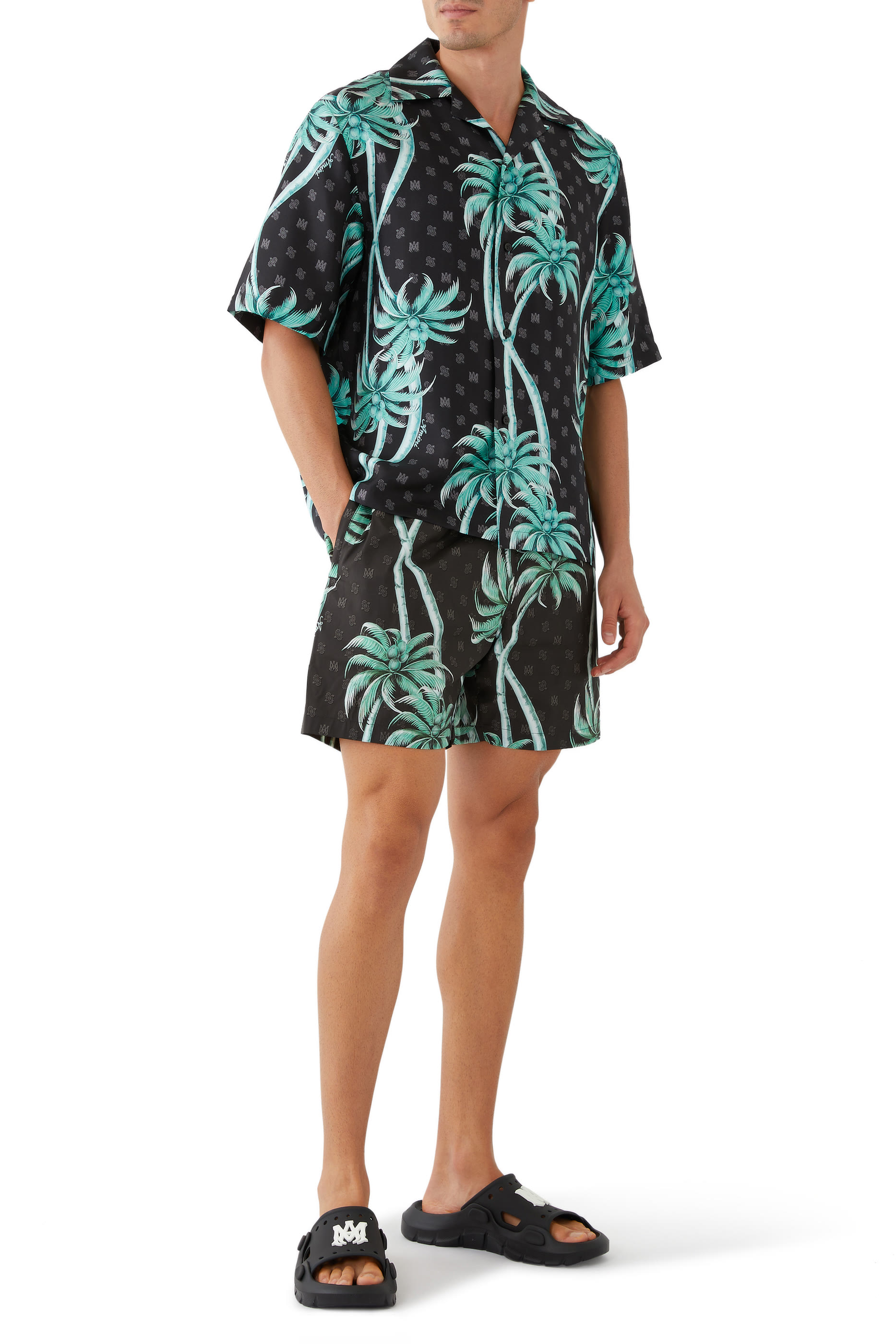 شورت سباحة بطبعات نخيل ملتوية