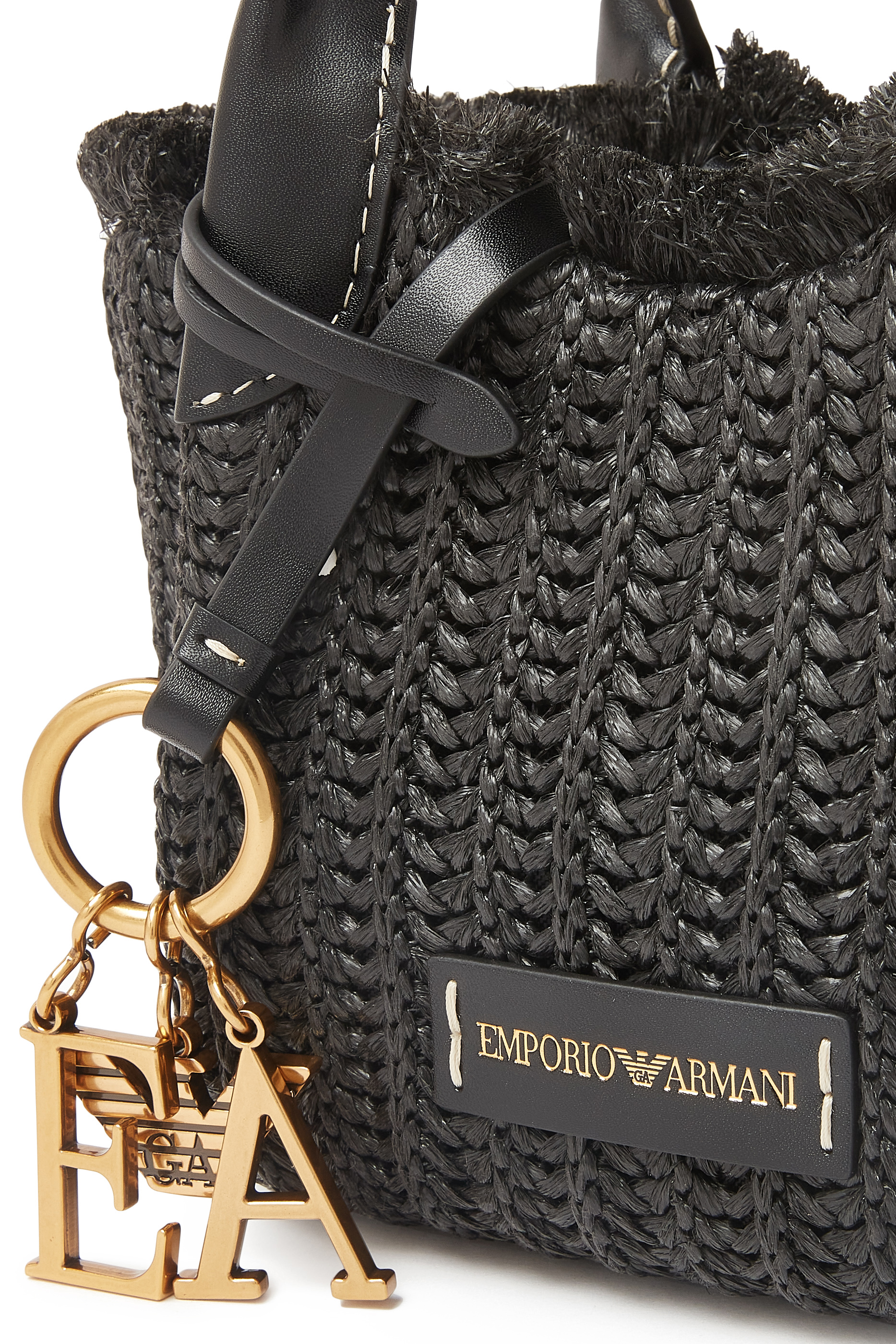 حقيبة يد بشعار الماركة خوص