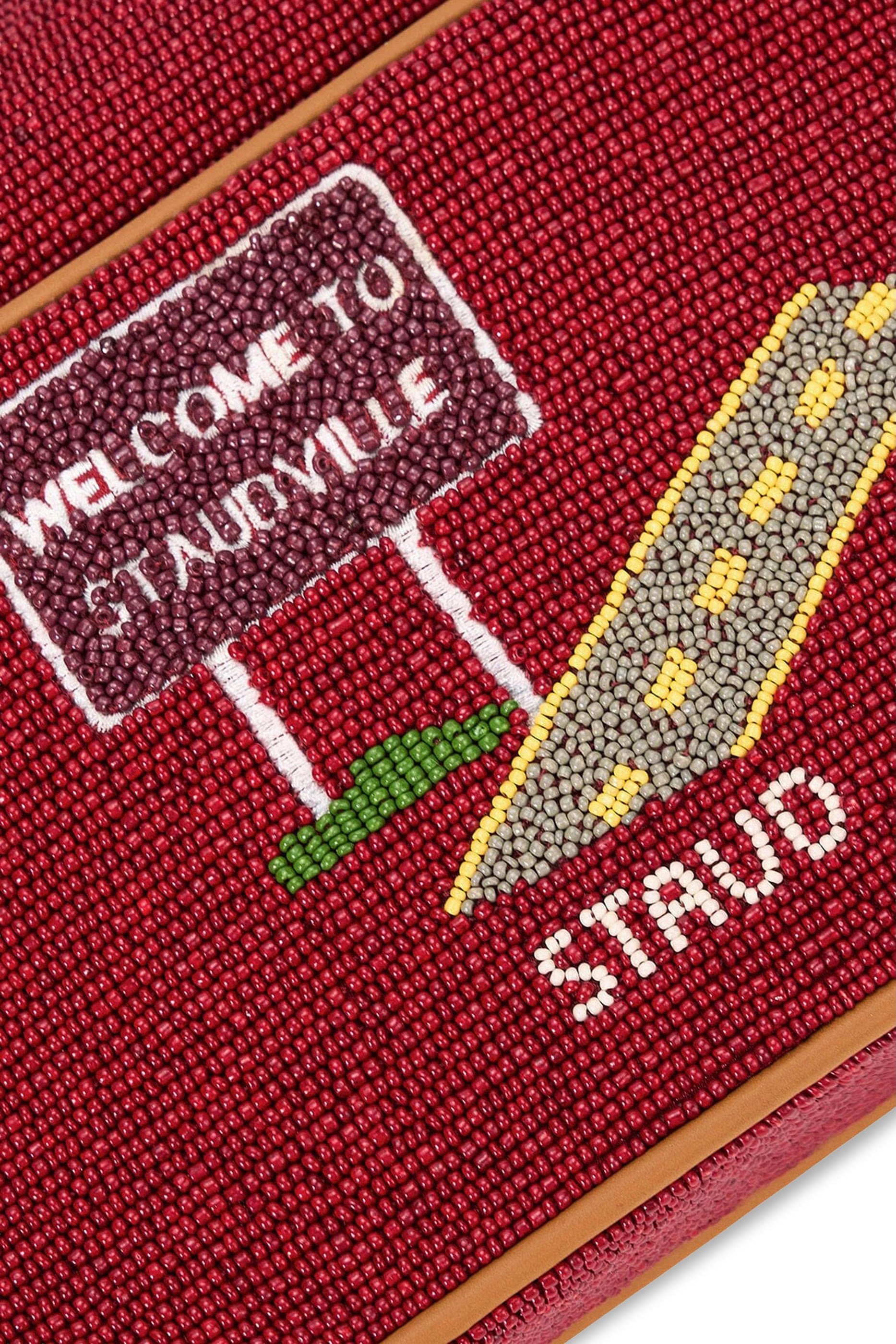 حقيبة تومي مطرزة بخرز