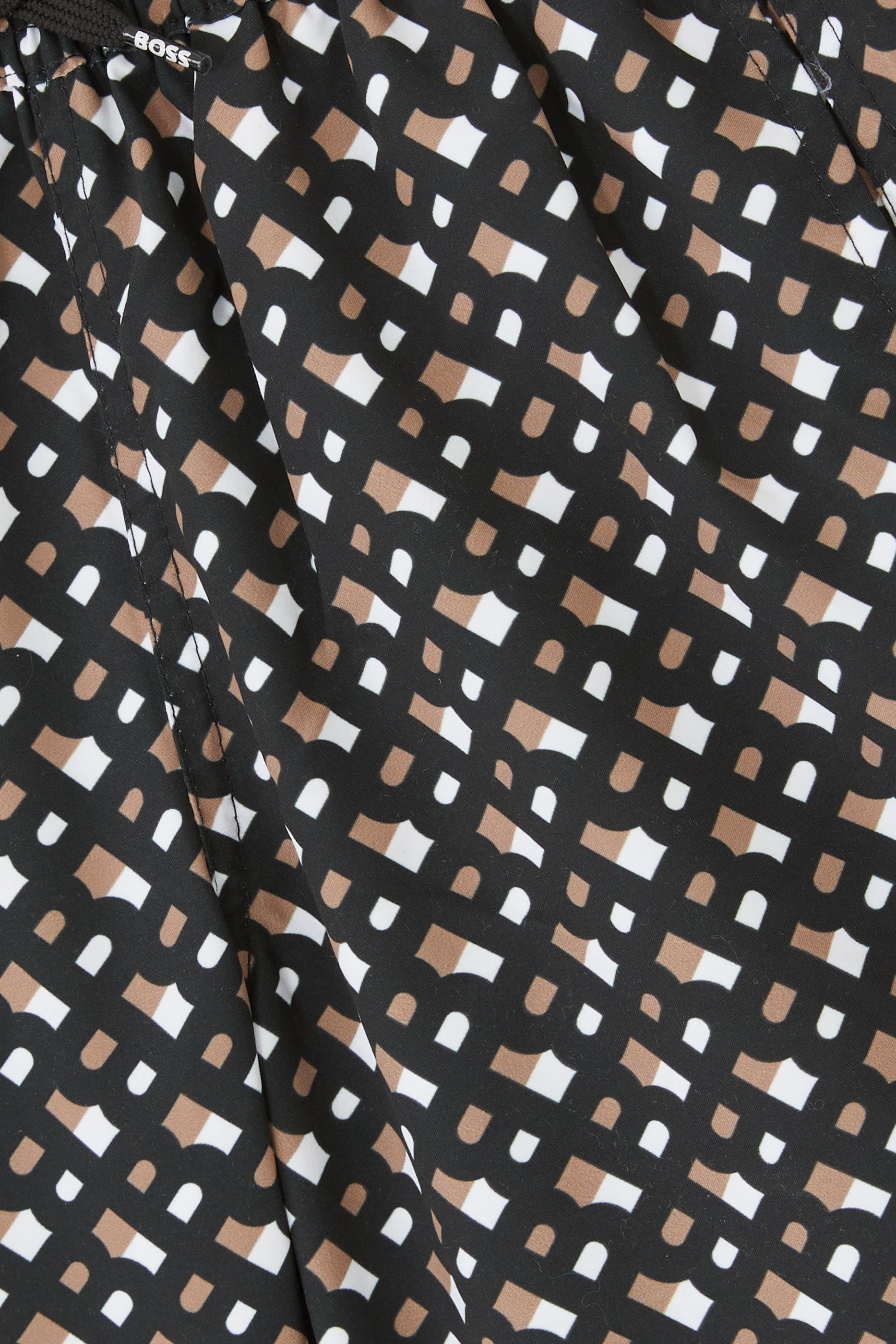 شورت سباحة بشعار الماركة للأطفال