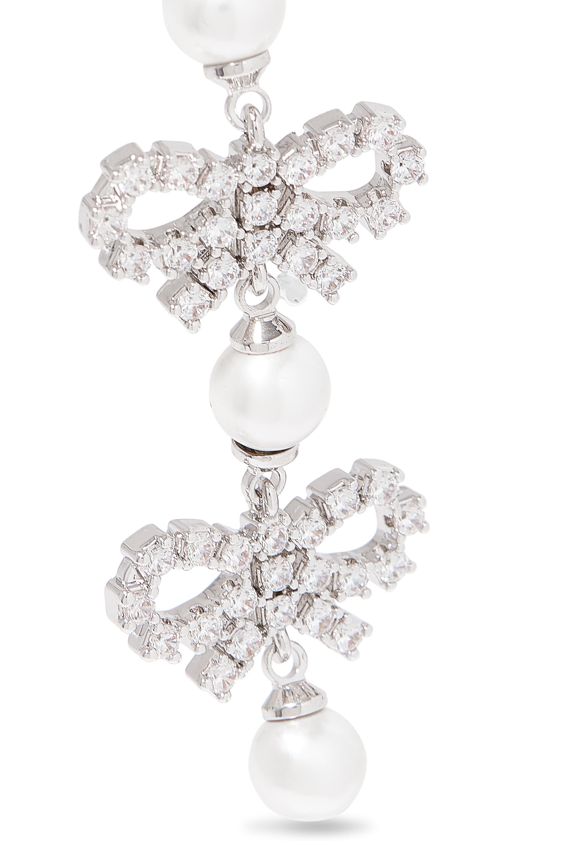 أقراط بتصميم متدرج بفيونكة صغيرة مرصعة بكريستال