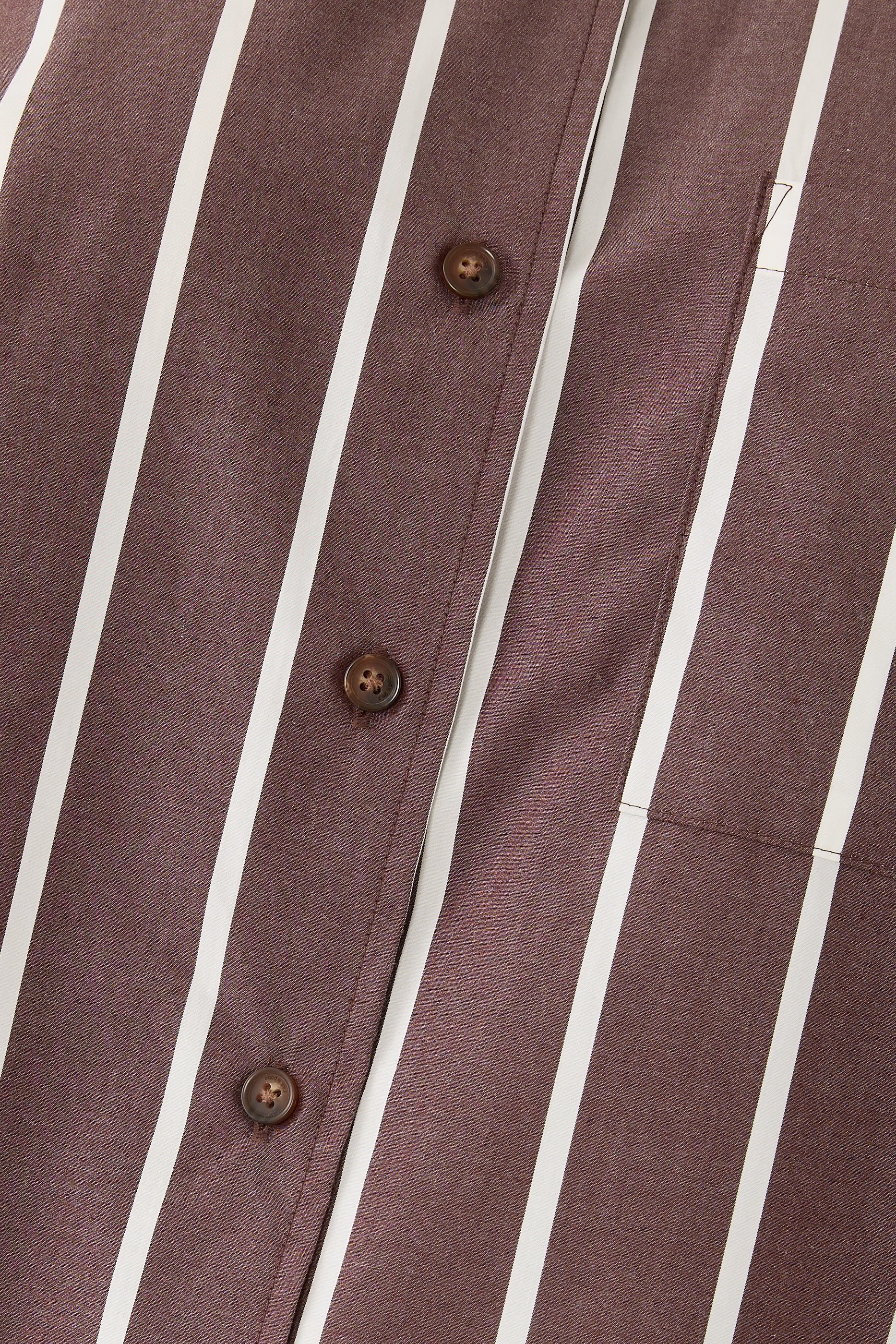 قميص مخطط كوني