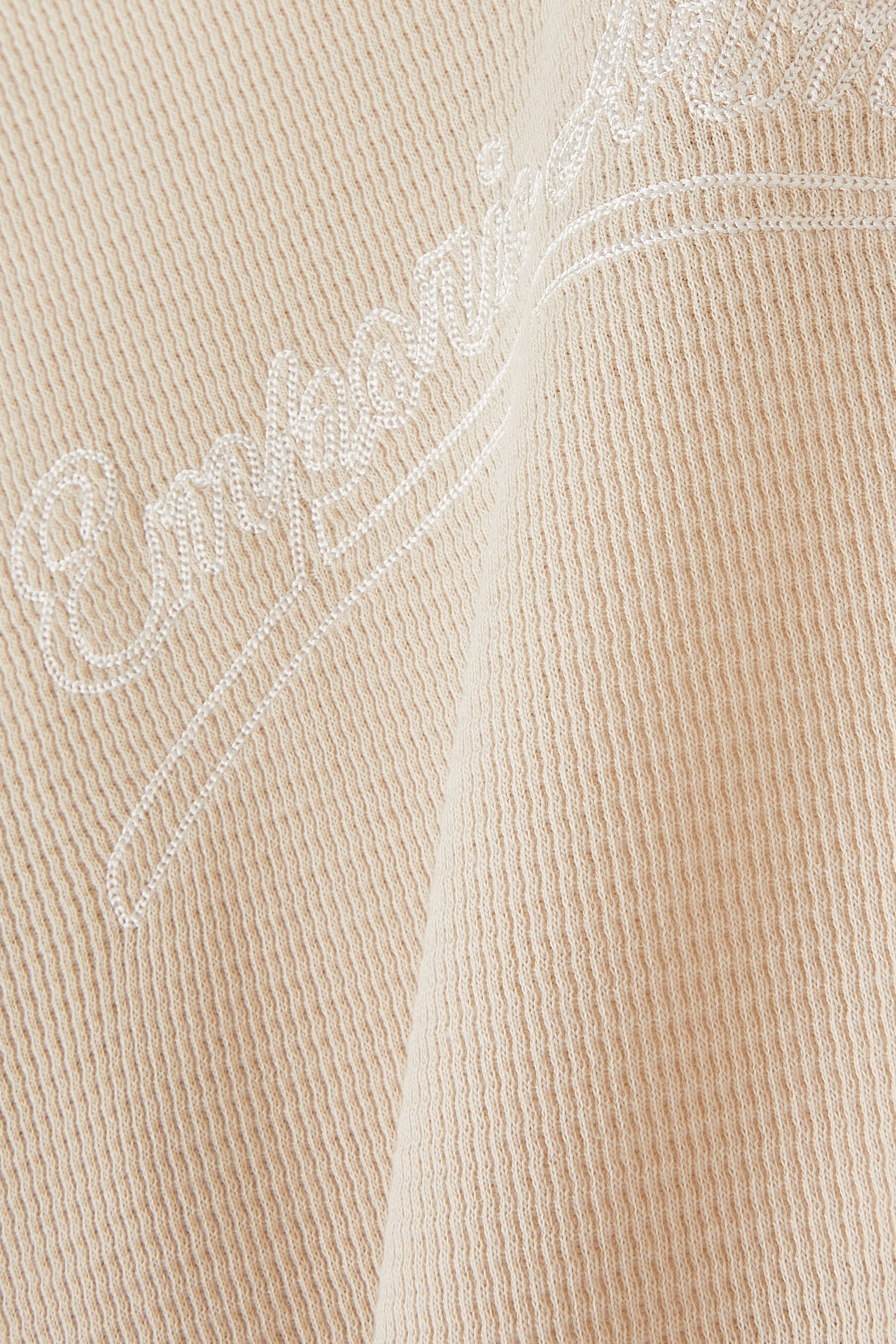 تيشيرت بشعار الماركة للأطفال