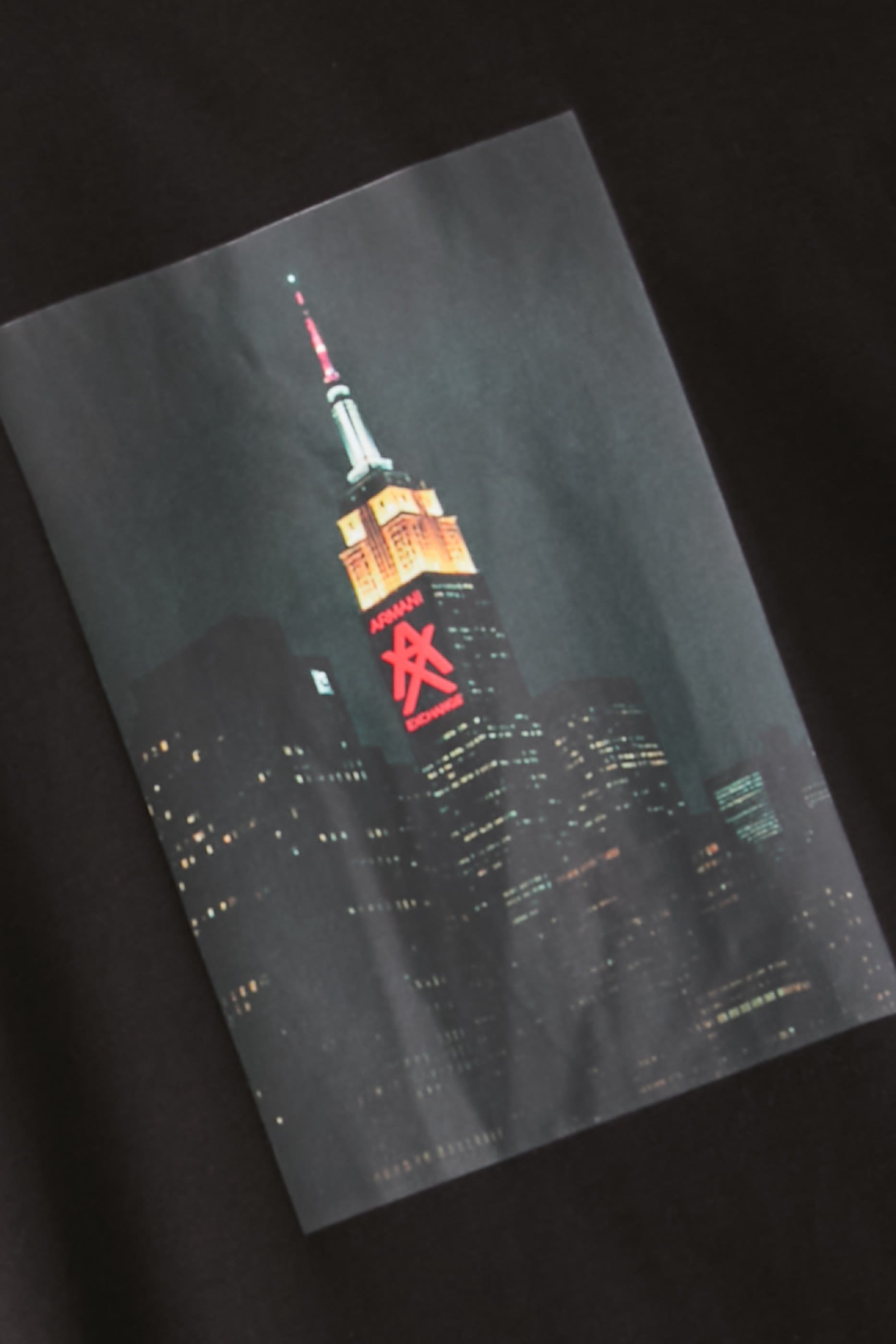 تيشيرت بشعار حرفي الماركة