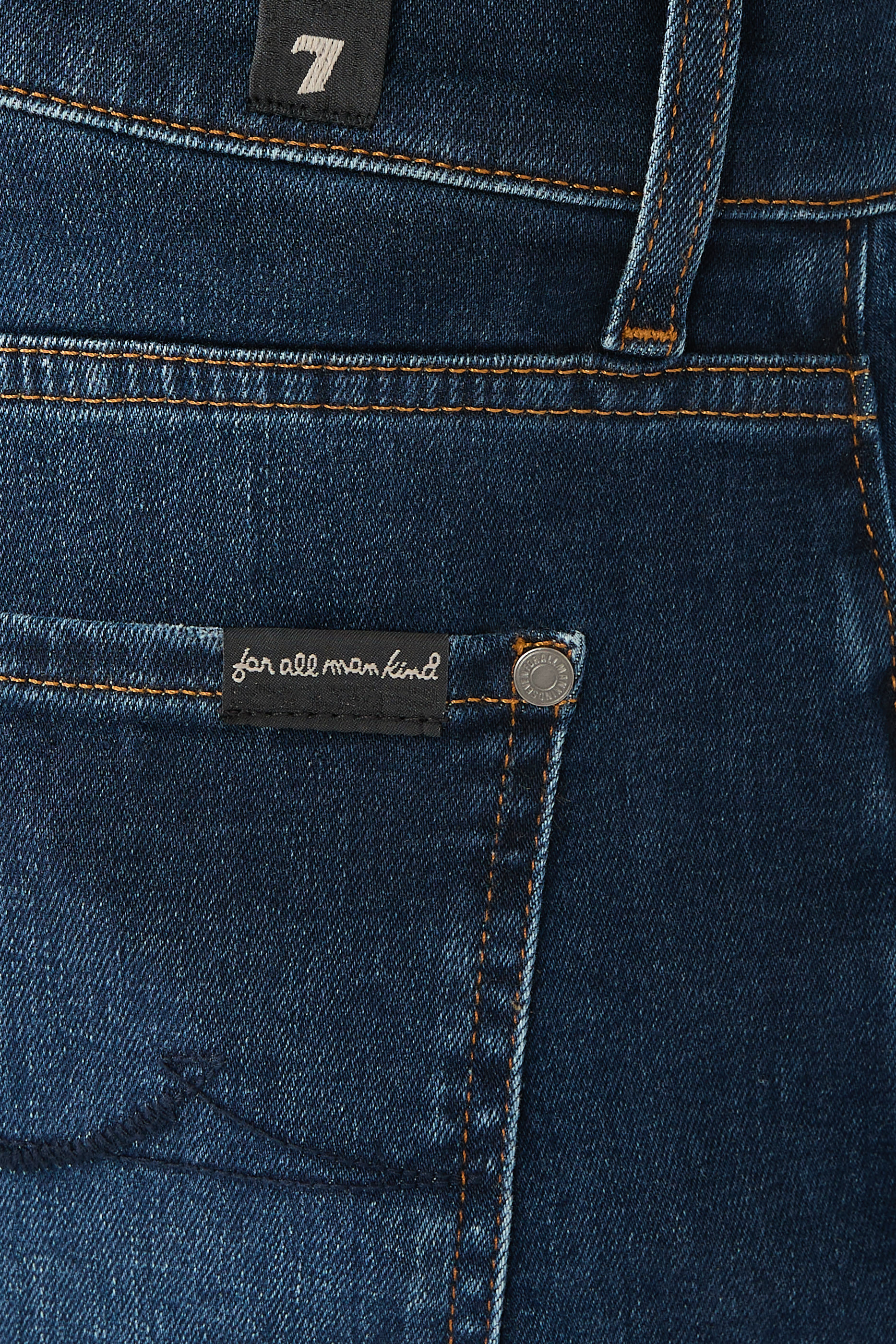 بنطال جينز ألتو بقصة تضيق نحو الأسفل