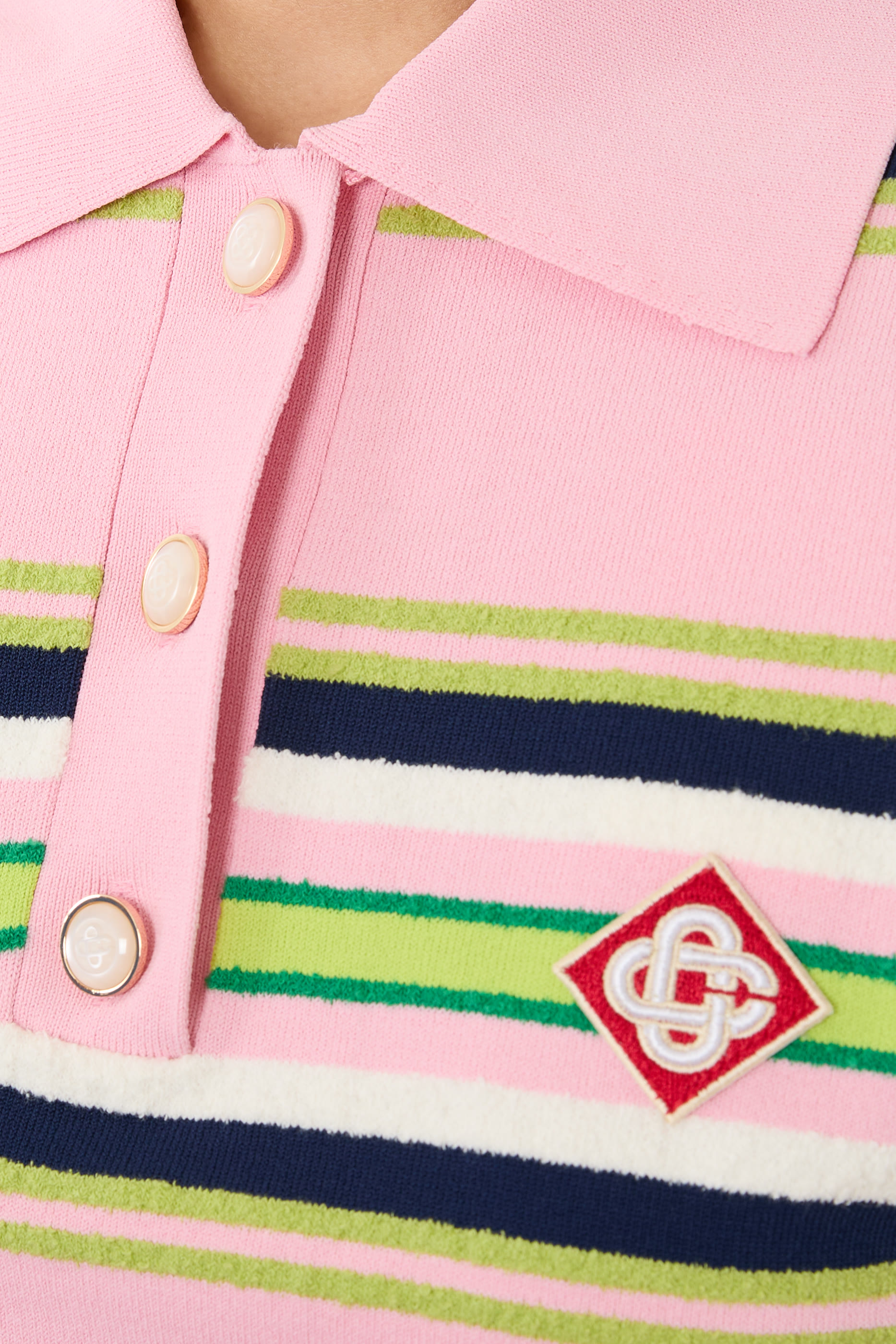 قميص بولو بقصة ضيقة ونقشة مخططة