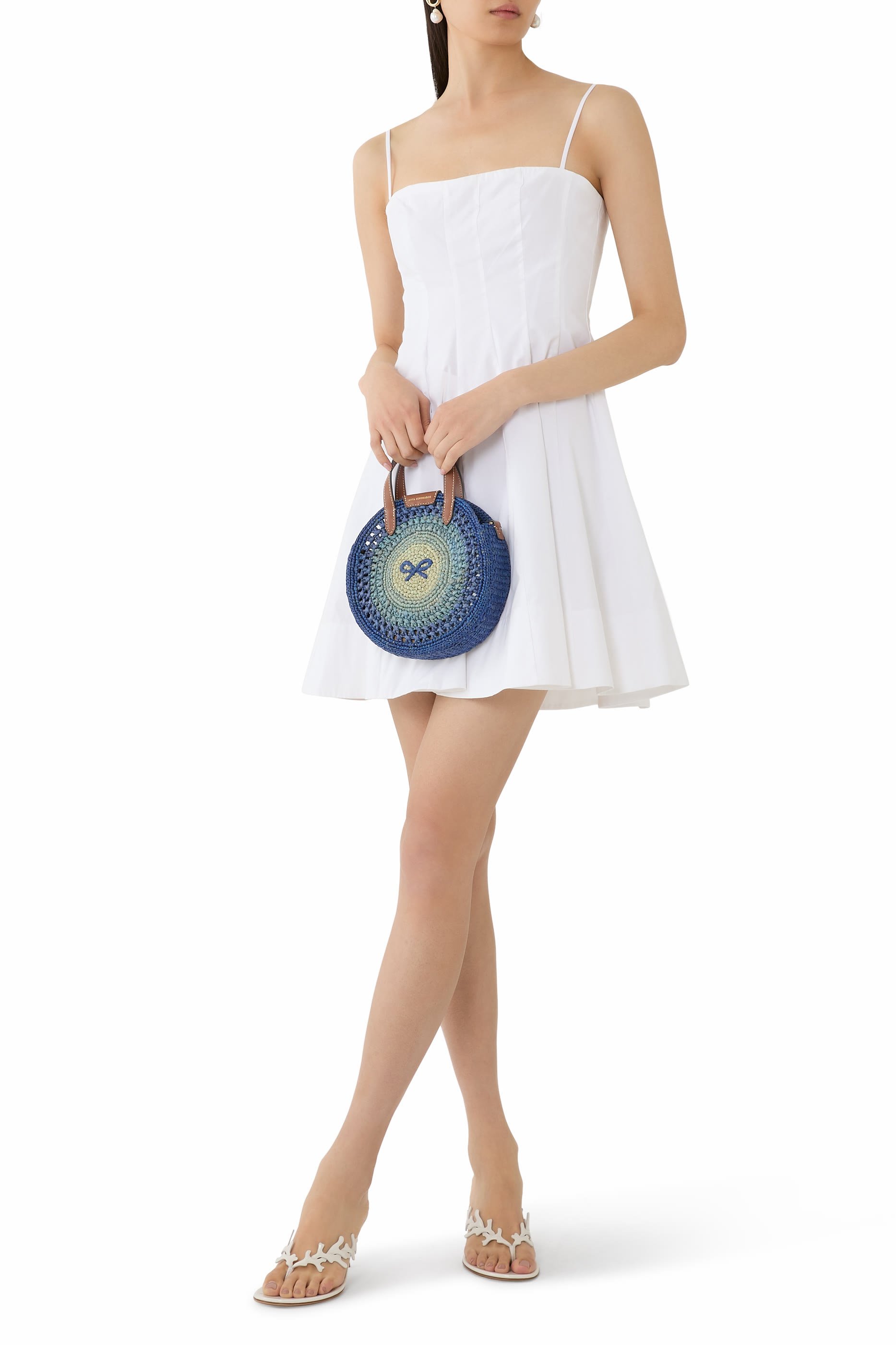 حقيبة يد صغيرة بتصميم مستدير بفيونكة مطرزة خوص